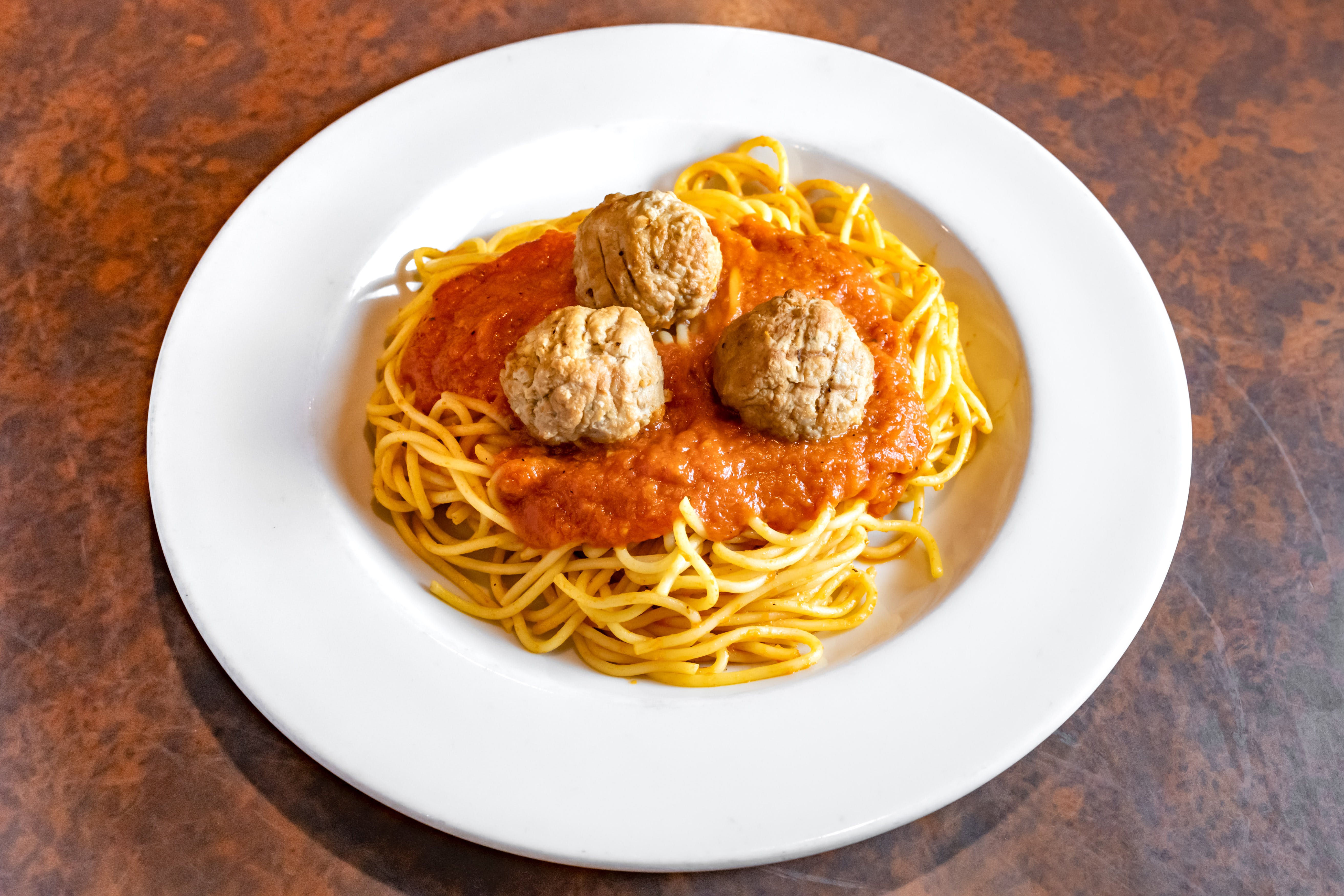 Order Spaghetti with Meatballs - Pasta food online from Paisano's store, Benbrook on bringmethat.com