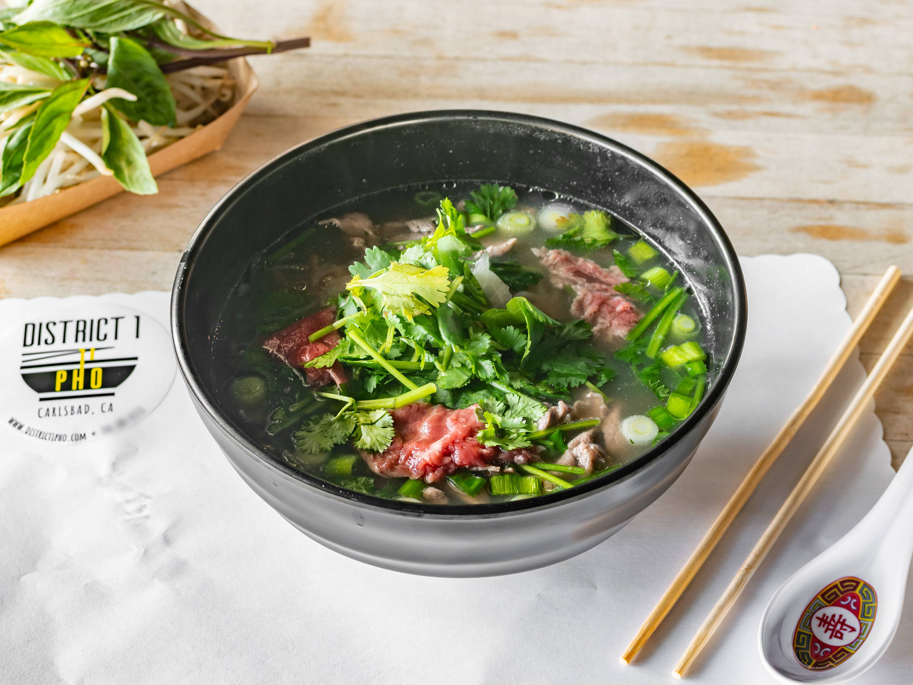 Order Phở Tái / Phở With Rare Filet Mignon food online from District 1 Pho store, Carlsbad on bringmethat.com
