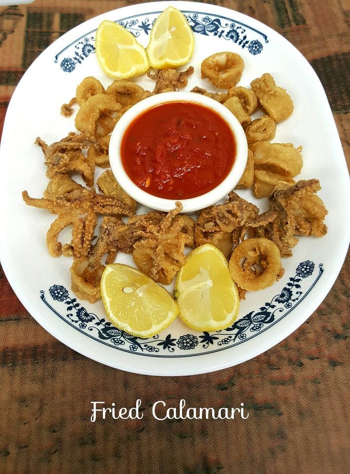 Order Fried Calamari - Appetizer food online from Little Vito Pizza store, Kernersville on bringmethat.com