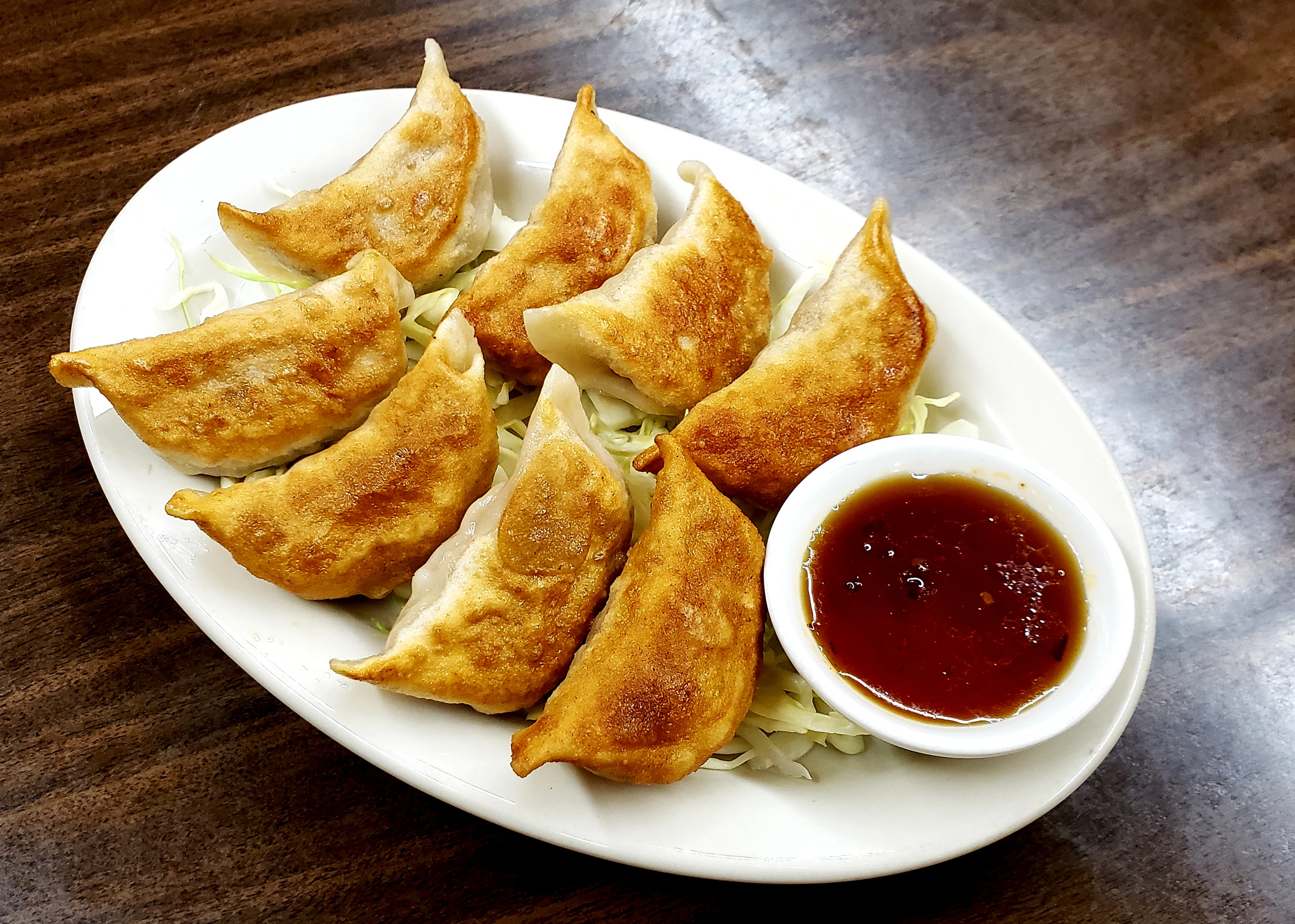Order 4. Pan Fried Pot Stickers food online from Jen Kitchen store, Sacramento on bringmethat.com