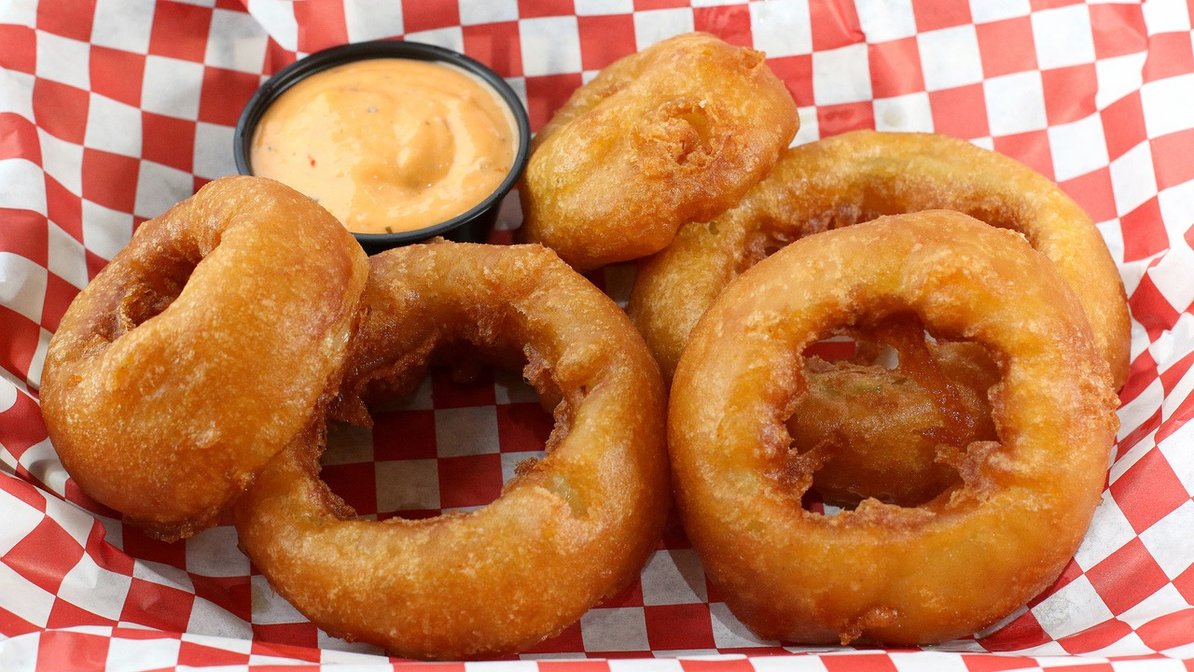 Order Beer Battered Onion Rings (5 Piece) food online from Papa Mak's Burgers store, San Francisco on bringmethat.com