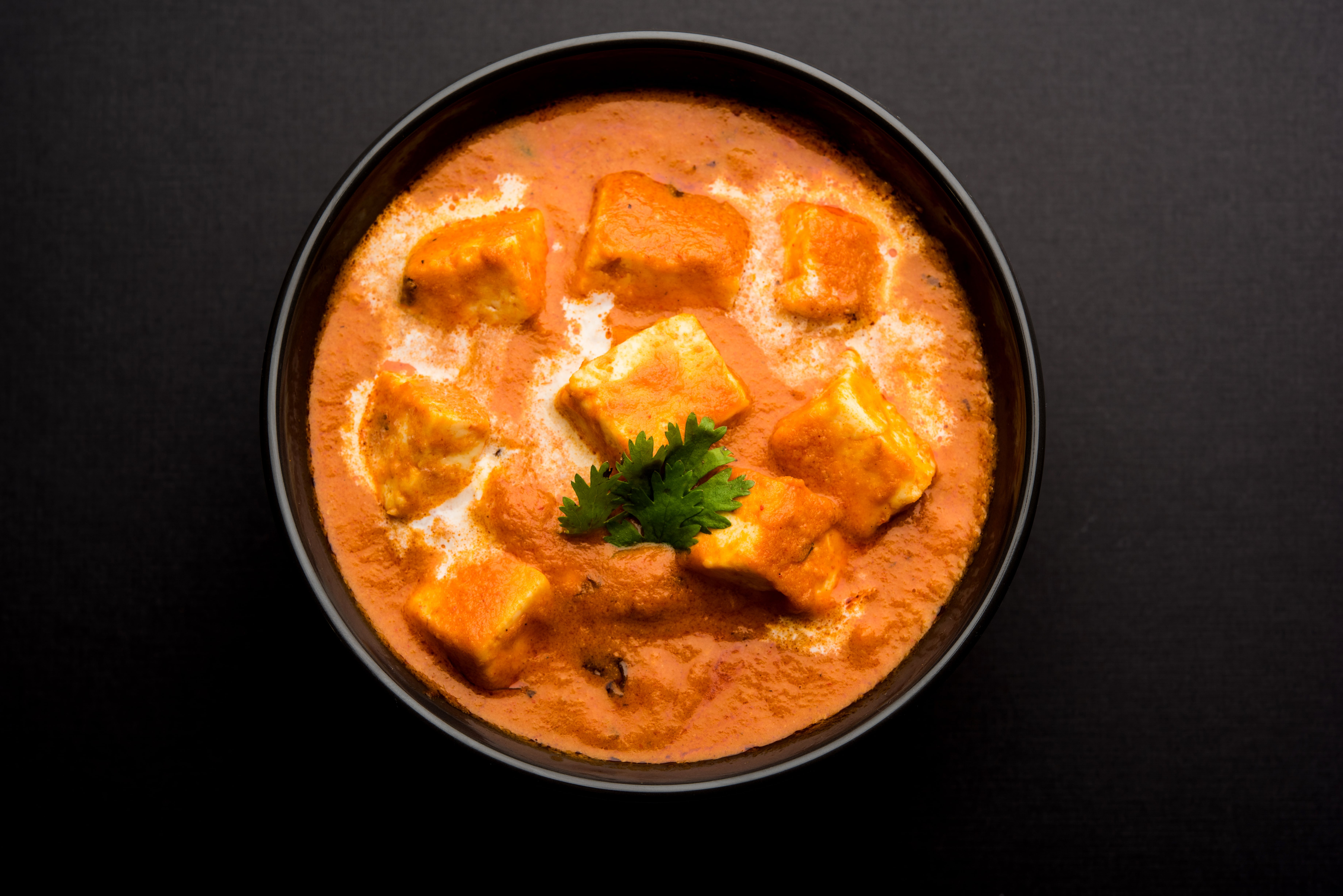Order Paneer butter Masala food online from Tropical Curry And Grill store, Pflugerville on bringmethat.com