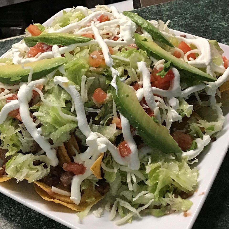 Order Nachos Deluxe food online from Silvia Authentic Mexican Cuisine store, Wichita on bringmethat.com