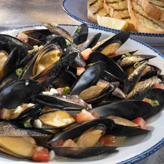 Order White Wine and Roasted-Garlic Mussels food online from Red Lobster store, Rocky Mount on bringmethat.com