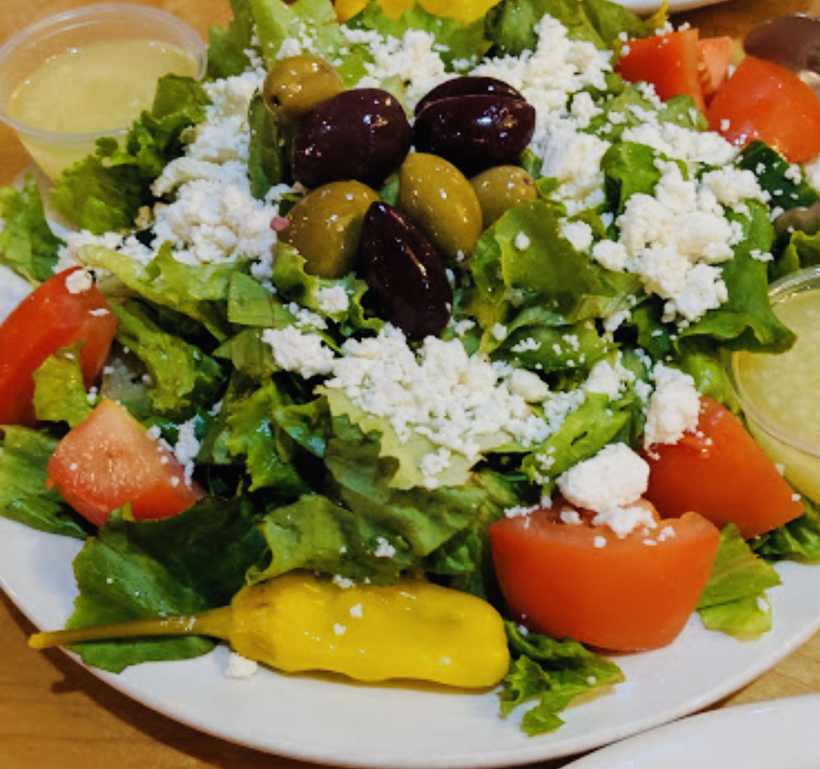 Order Greek Salad food online from Andys Mediterranean Grille store, Cincinnati on bringmethat.com
