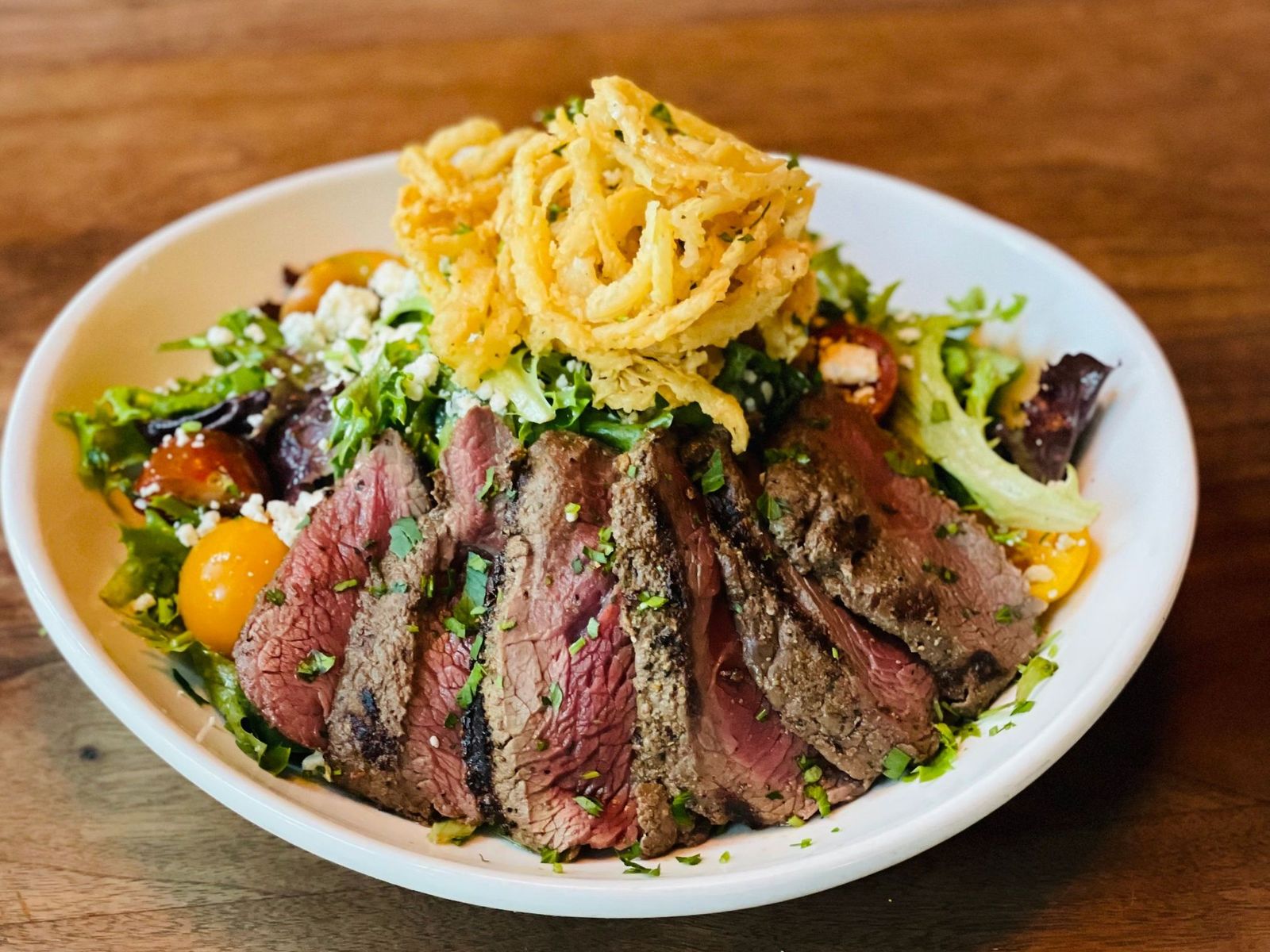 Order Steak Salad* food online from Eureka! store, Boise on bringmethat.com