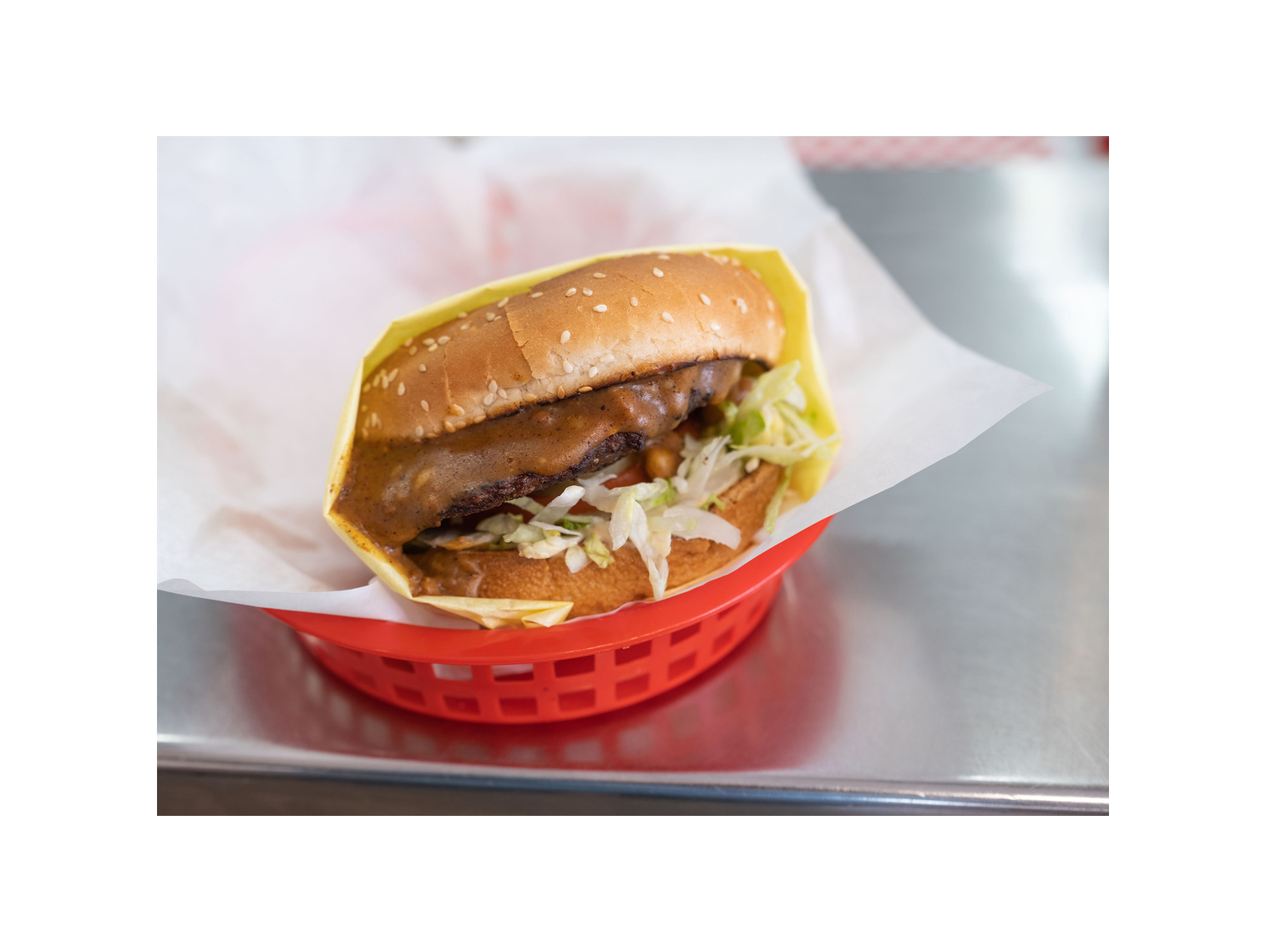 Order Chili Cheeseburger food online from Norm Famous Burgers store, Whittier on bringmethat.com