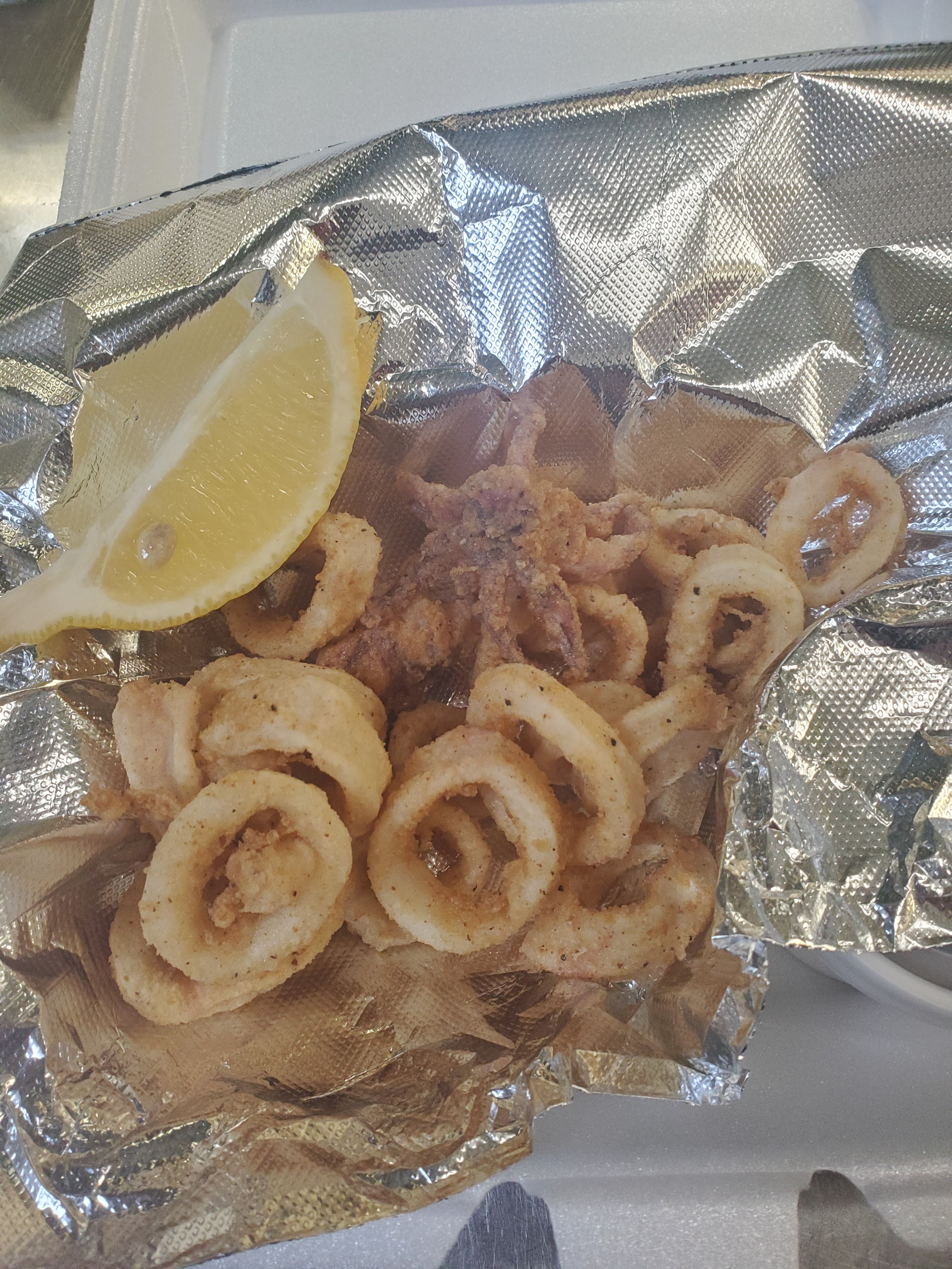 Order Fresh Fried Calamari with Marinara Sauce - Appetizer food online from Pizza Cucina store, Oswego on bringmethat.com