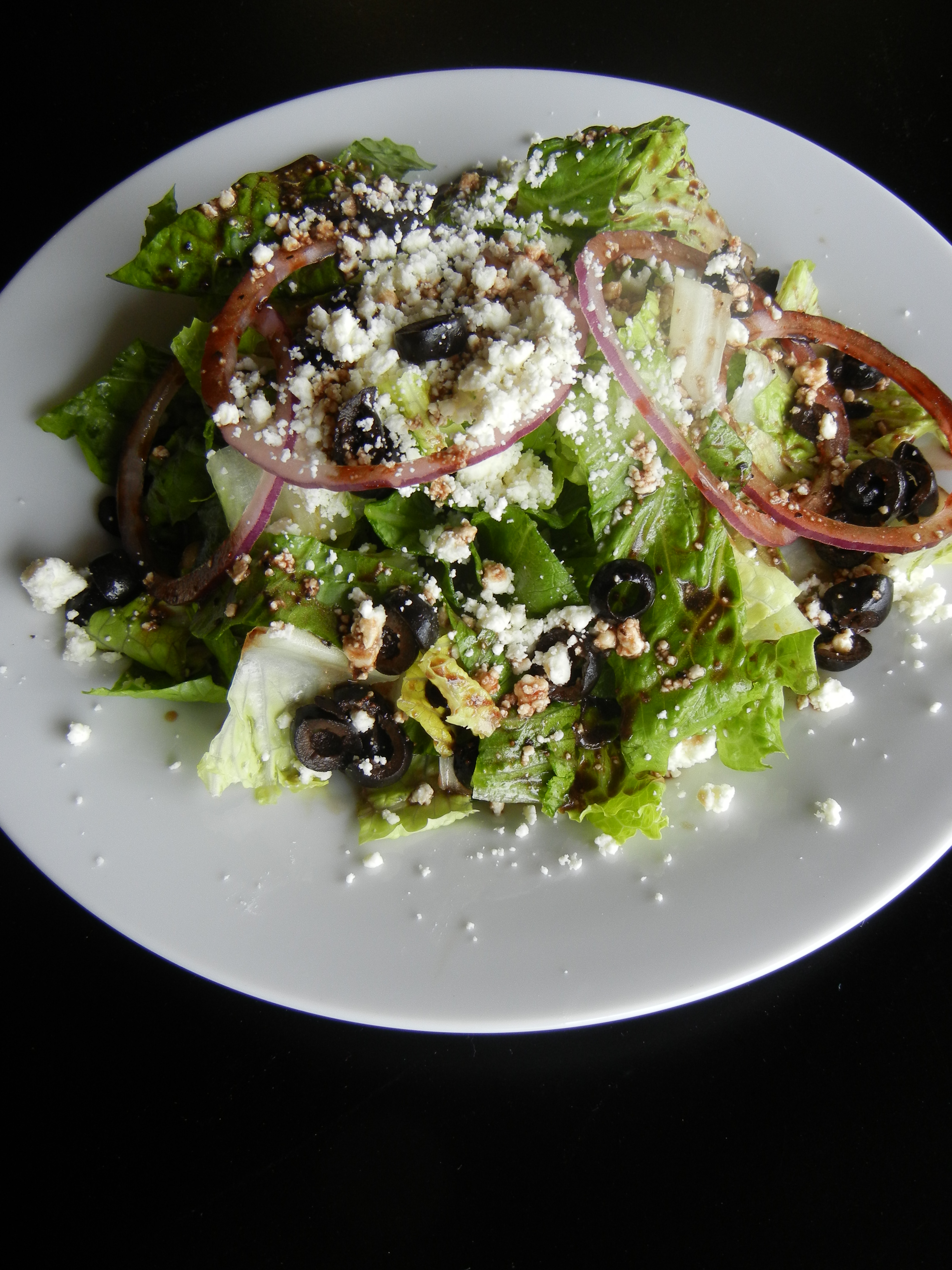 Order Greek Salad food online from Craigo's Pizza & Pastaria store, Austin on bringmethat.com
