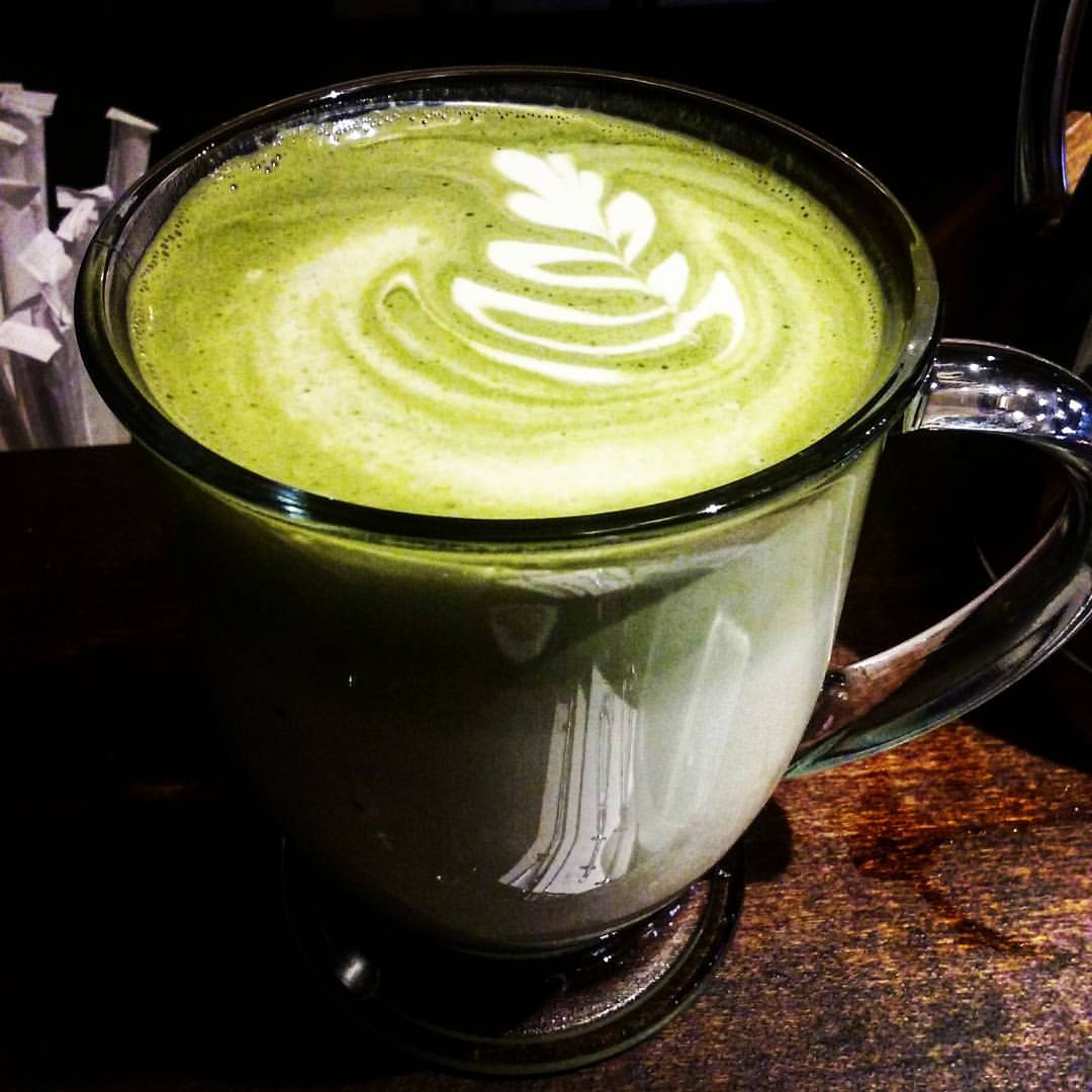 Order 16oz Matcha Latte (comes unsweetened unless you choose a flavor) food online from Agora Downtown Coffee Shop & Used Books store, Fredericksburg on bringmethat.com