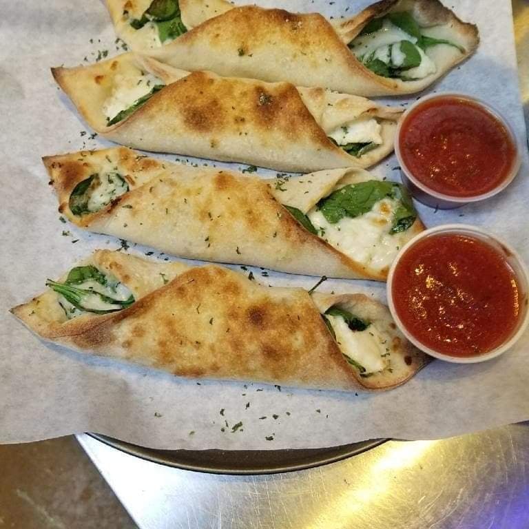 Order Spinach & Ricotta Rolls - 4 Pieces food online from Royal Pizza store, San Antonio on bringmethat.com