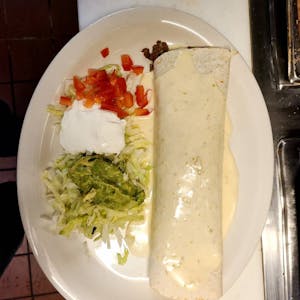 Order Burrito Deluxe food online from Ixtapa Mexican Grill & Cantina store, Camdenton on bringmethat.com