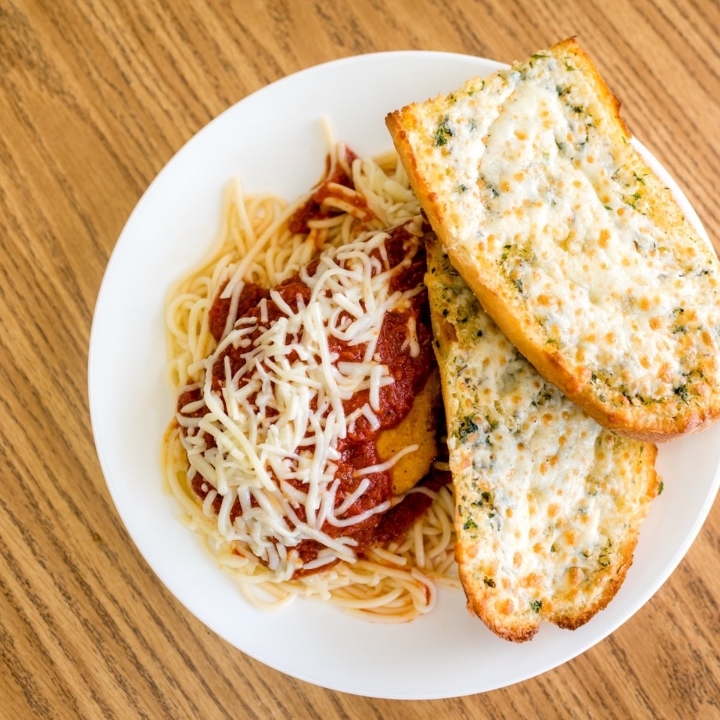 Order CHICKEN PARM Dinner* food online from Pasquale's Pizzeria store, Dravosburg on bringmethat.com