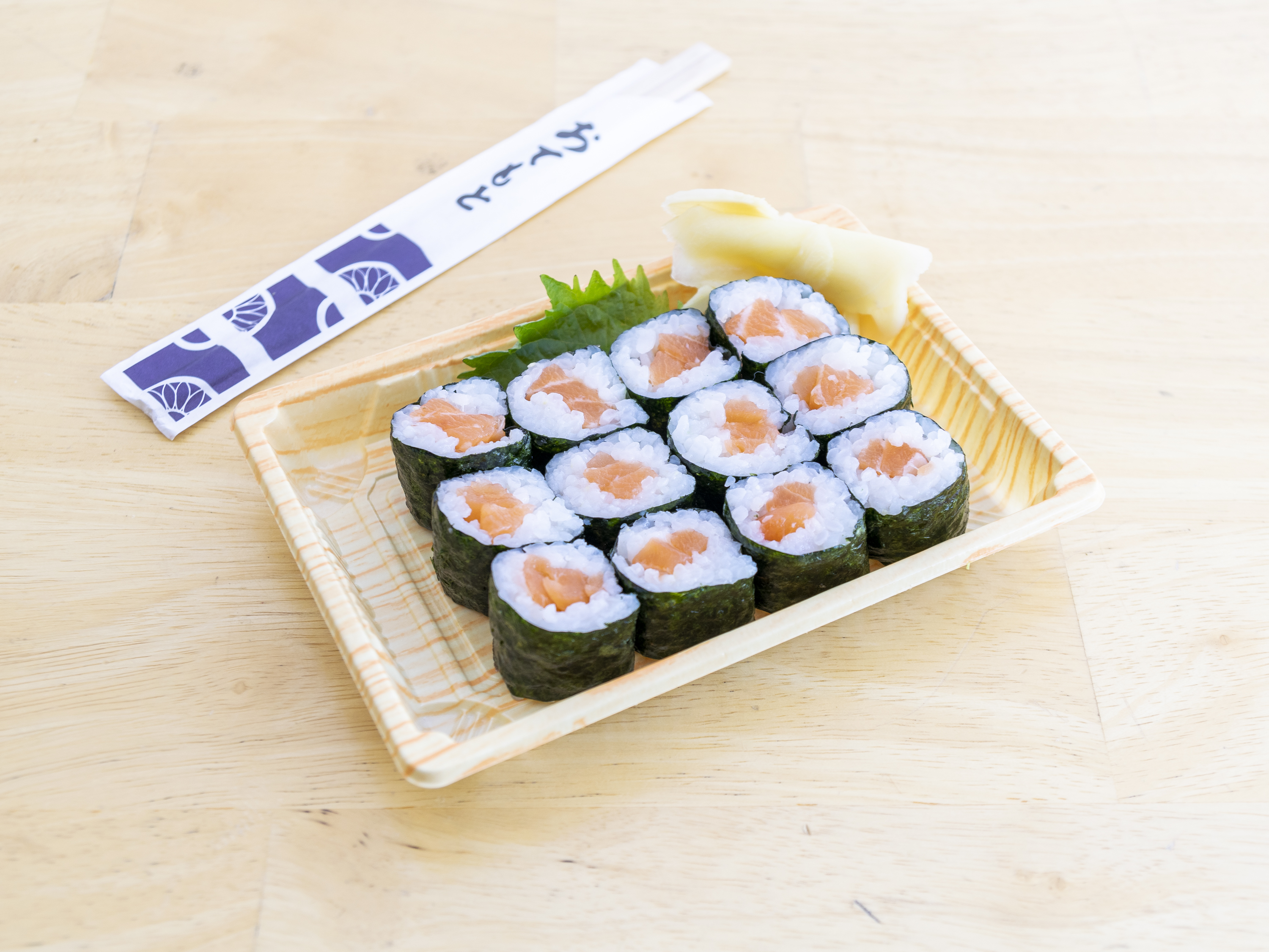 Order 20.  Spicy Salmon Roll food online from Oishinbo store, Harrison on bringmethat.com