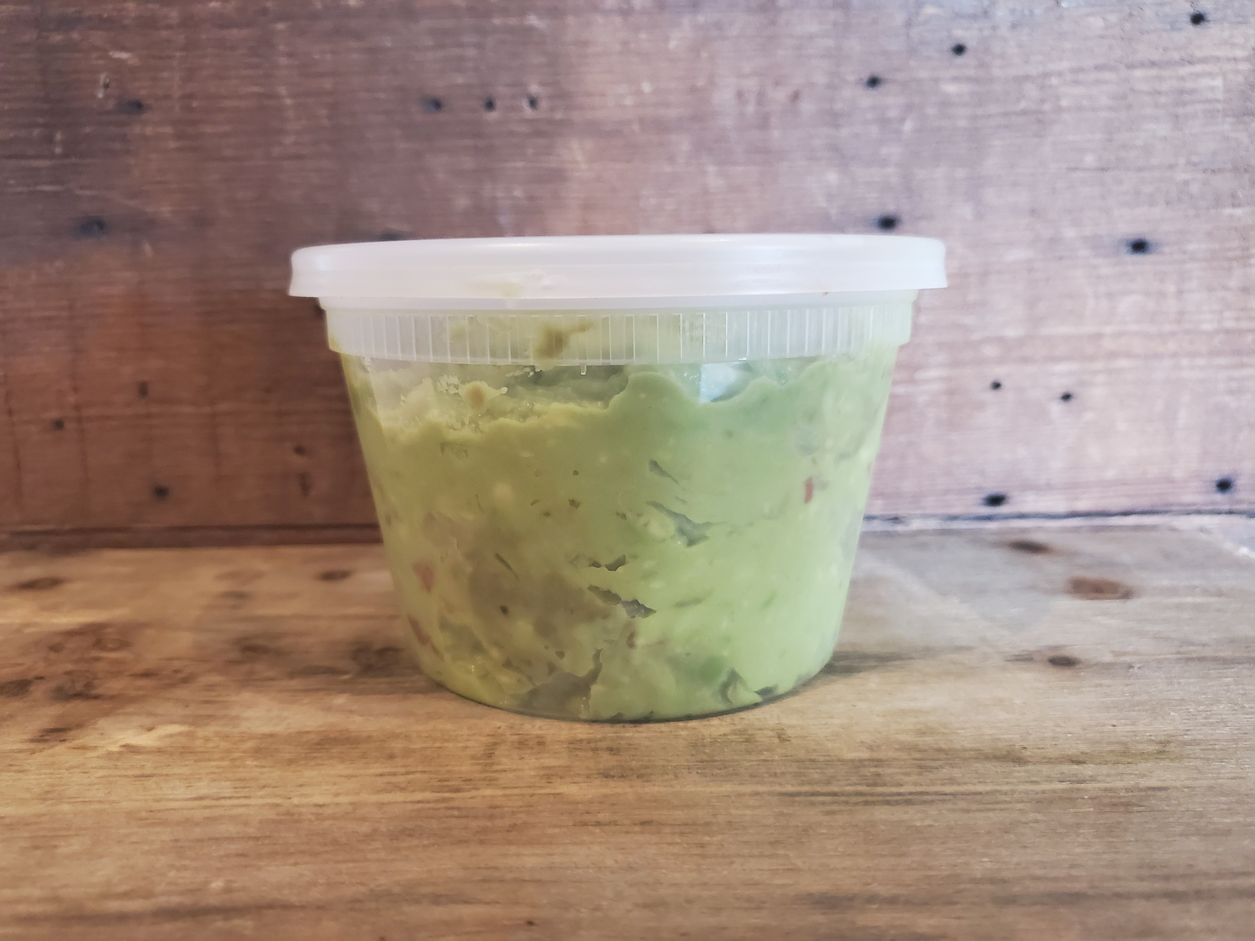 Order 16 oz. Side of Fresh Guacamole food online from Cactus Modern Mexican & Cantina store, Lincoln on bringmethat.com