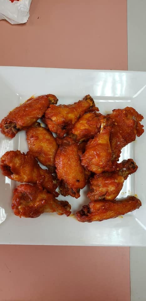Order Chicken Wings - 12 Pieces food online from Caffe Catania Pizzeria & Pasta store, Copiague on bringmethat.com