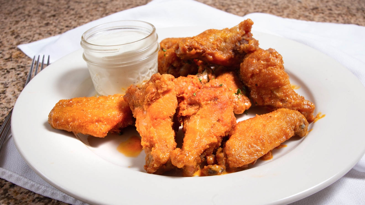 Order Buffalo Wings food online from Sliceworks store, Denver on bringmethat.com