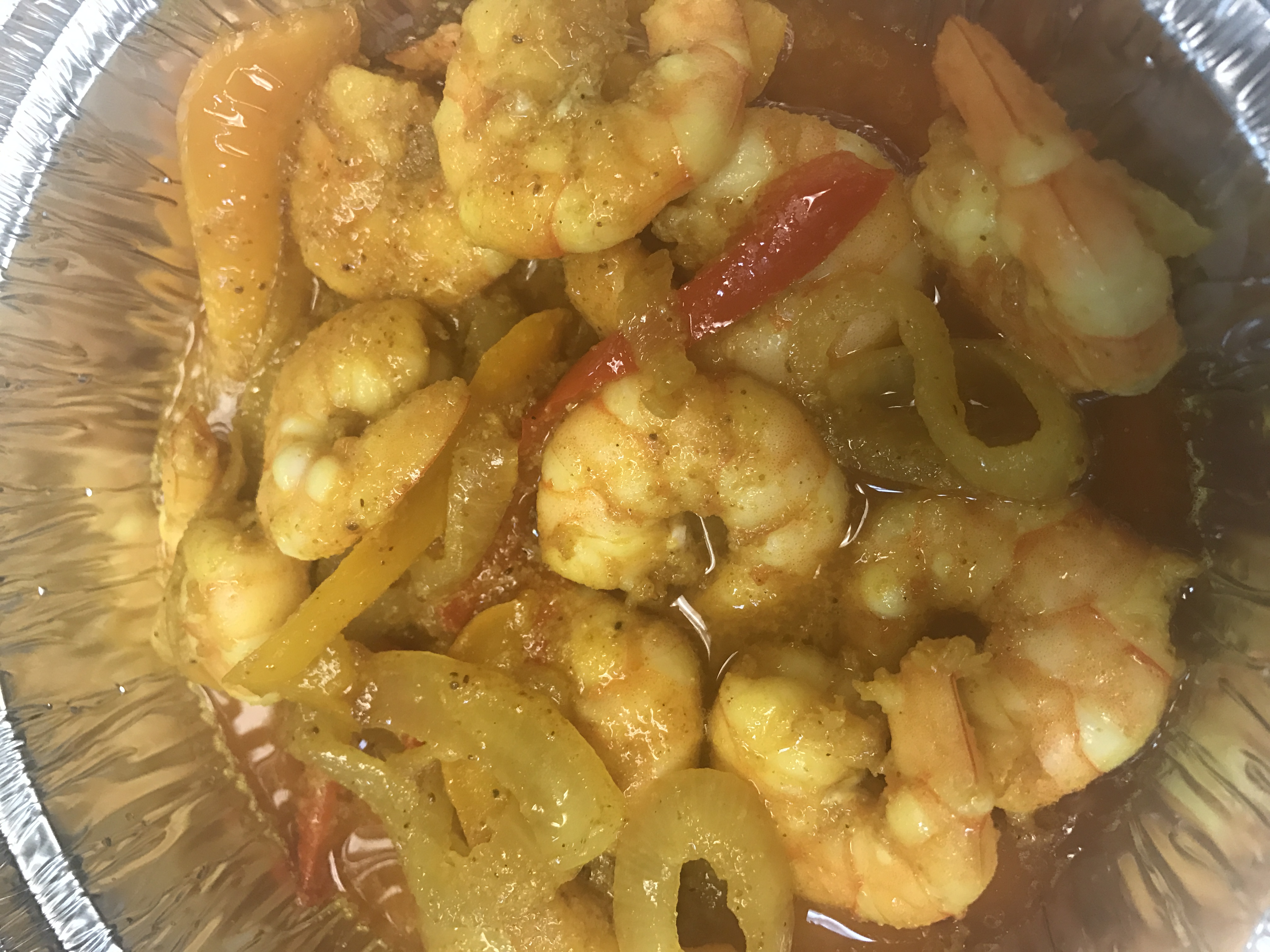 Order Curry Shrimp food online from Uncle Ralston's Jamaican Homestyle Cooking store, Freehold on bringmethat.com