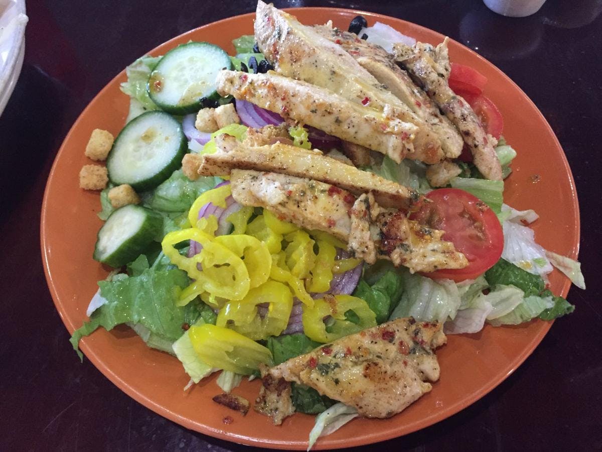 Order Grilled Chicken Salad - Salad food online from Primo Italian Cuisine & Catering store, Unicoi on bringmethat.com