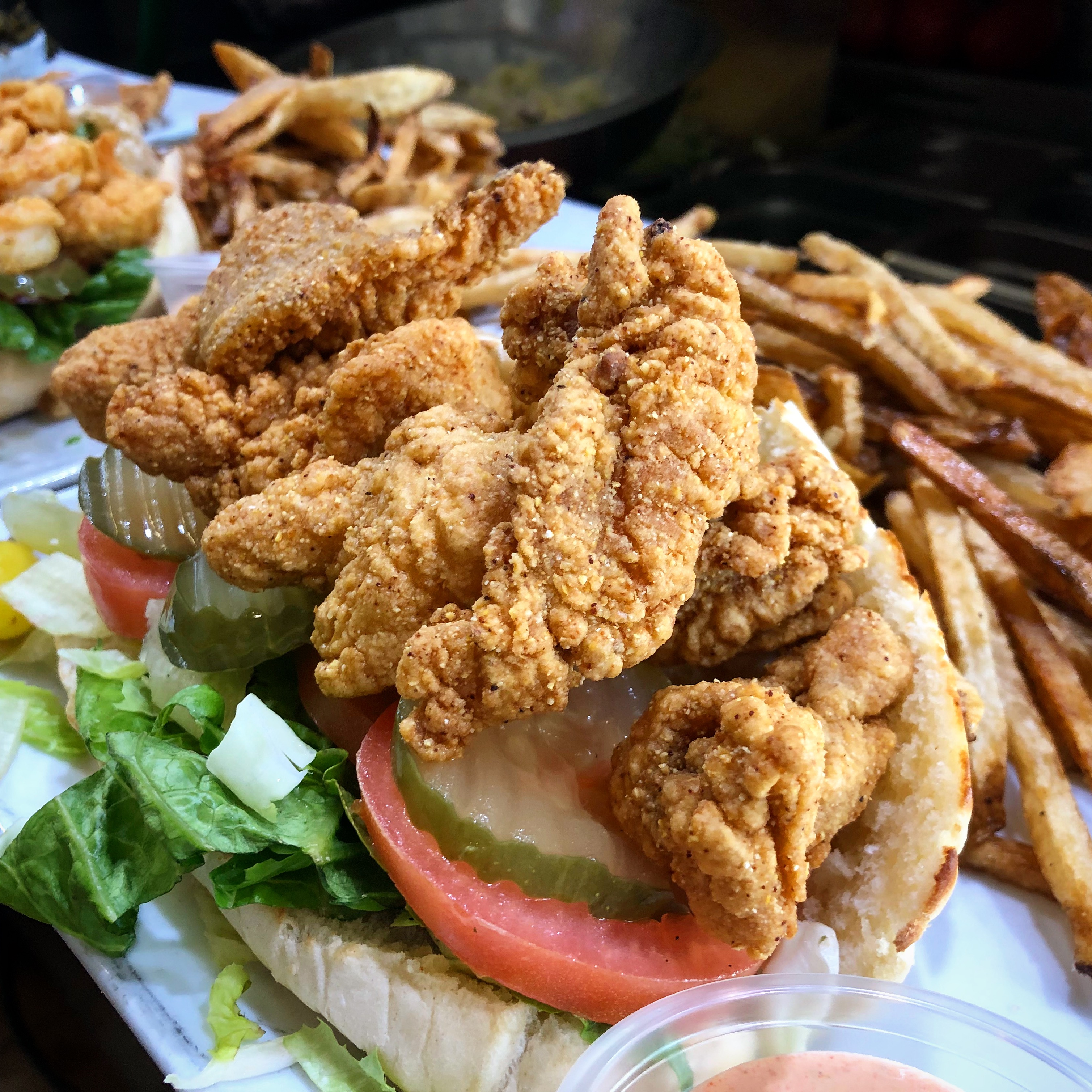 Order Catfish Po'Boy food online from Stevie Creole Cafe store, Los Angeles on bringmethat.com