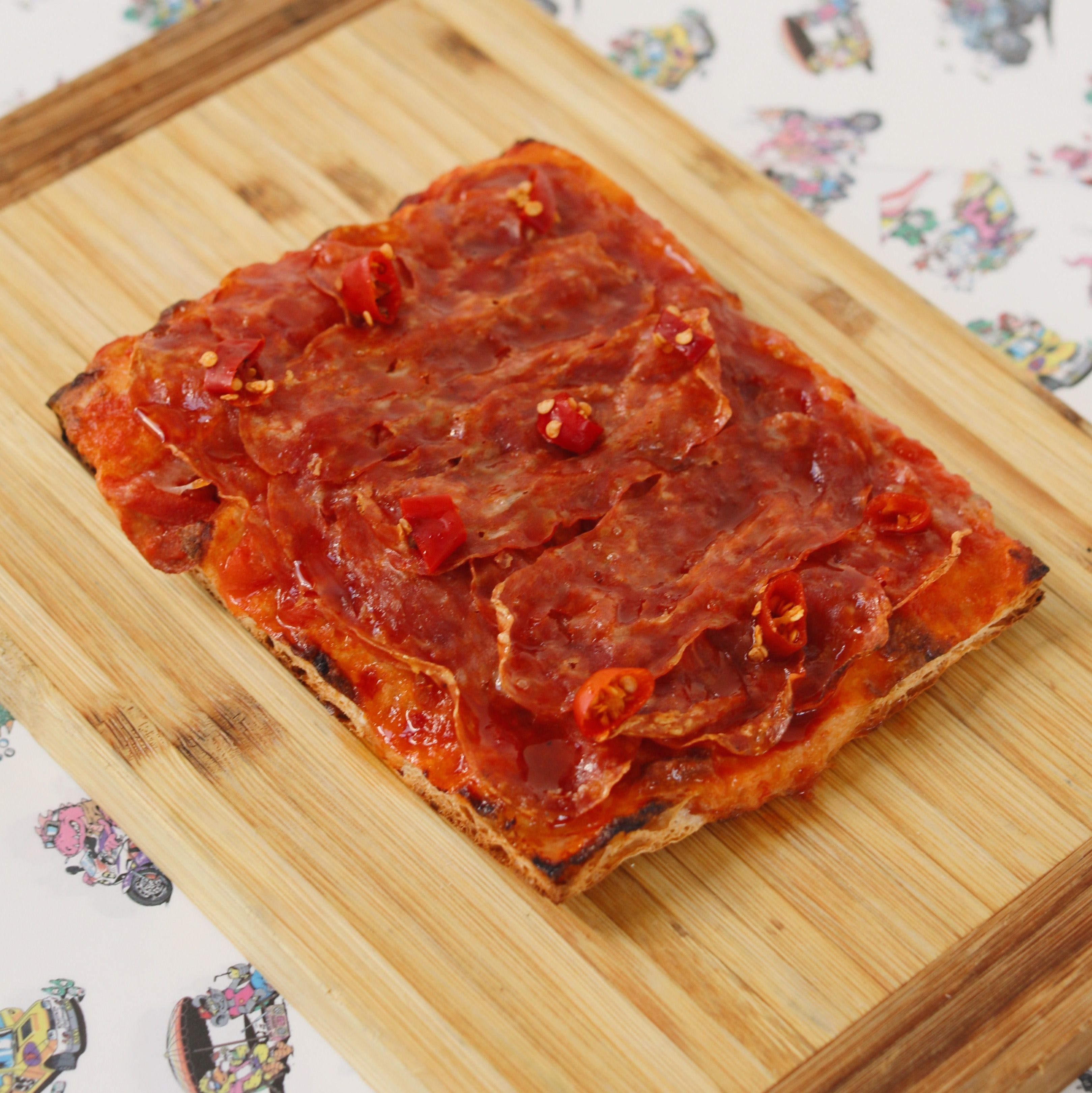 Order Spicy Soppressata Pizza Slice - Slice food online from Chill Since 93 store, Los Angeles on bringmethat.com