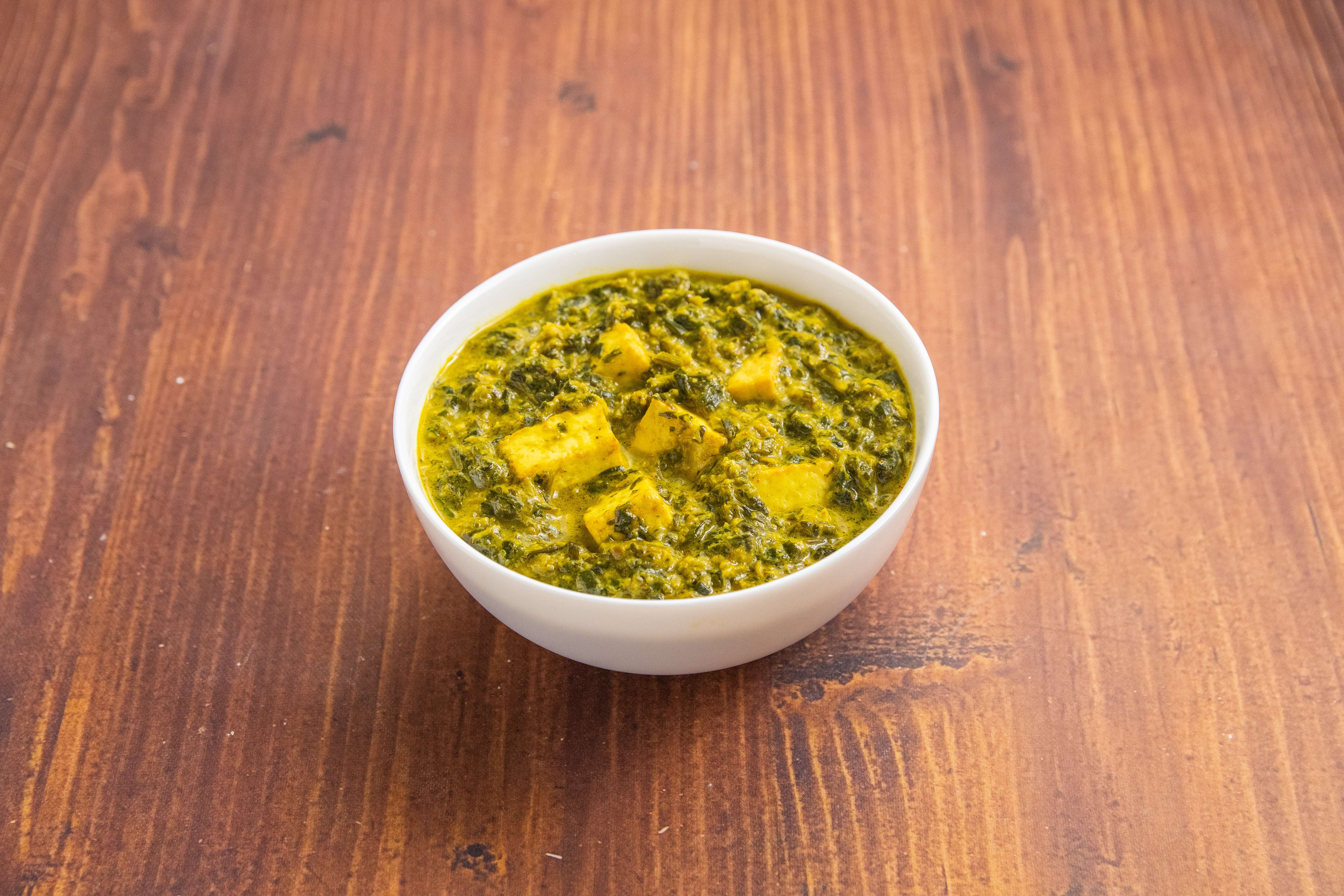 Order 56. Saag Paneer food online from The India Cafe store, Costa Mesa on bringmethat.com