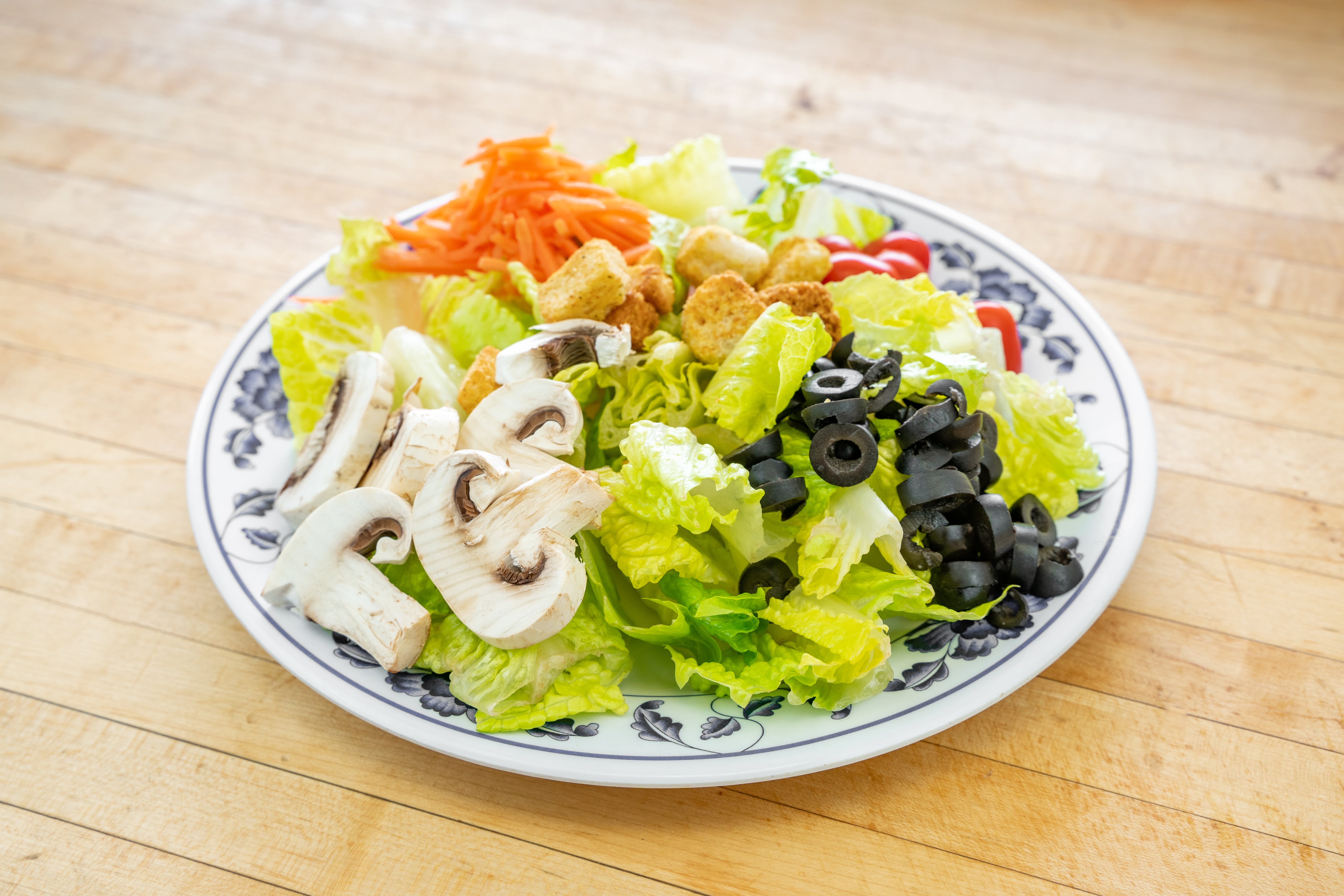 Order Garden Salad - Salad food online from Checkers pizza and ribs store, San Jose on bringmethat.com
