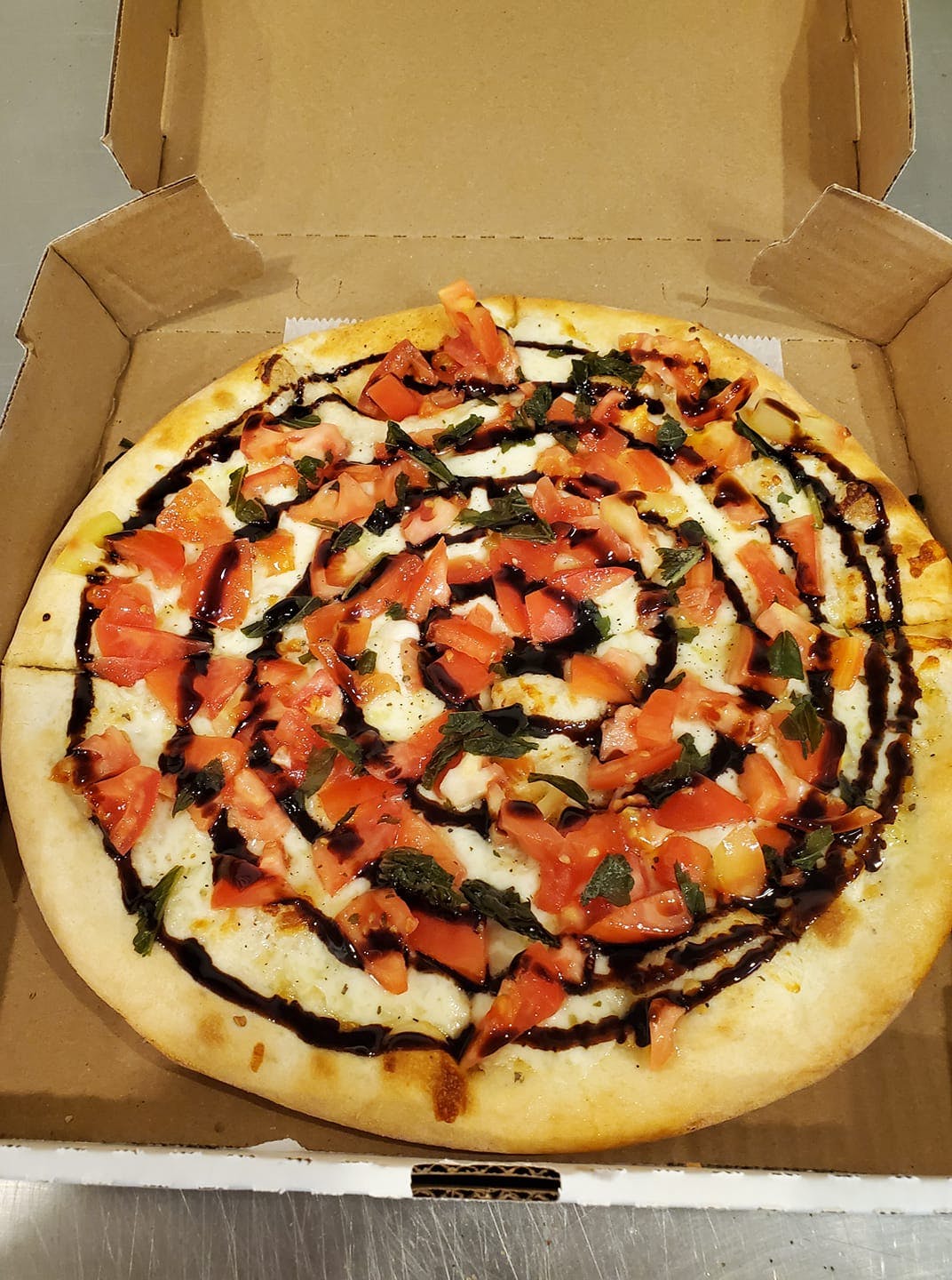 Order Bruschetta Pizza - Small food online from Carini Italian Restaurant store, Danville on bringmethat.com