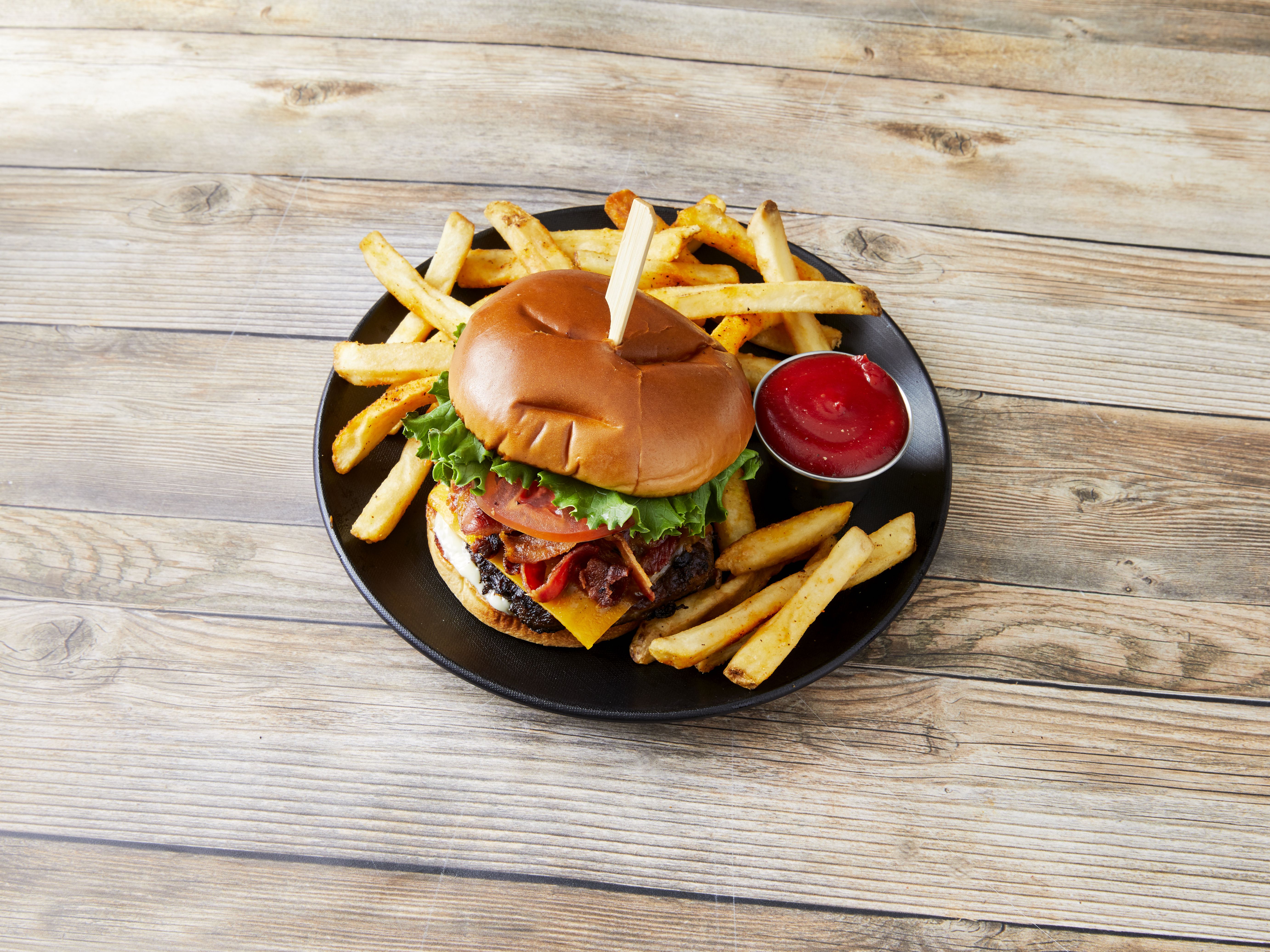 Order Cheddar and Bacon Burger food online from Brann's Steakhouse & Grille store, Grand Rapids on bringmethat.com