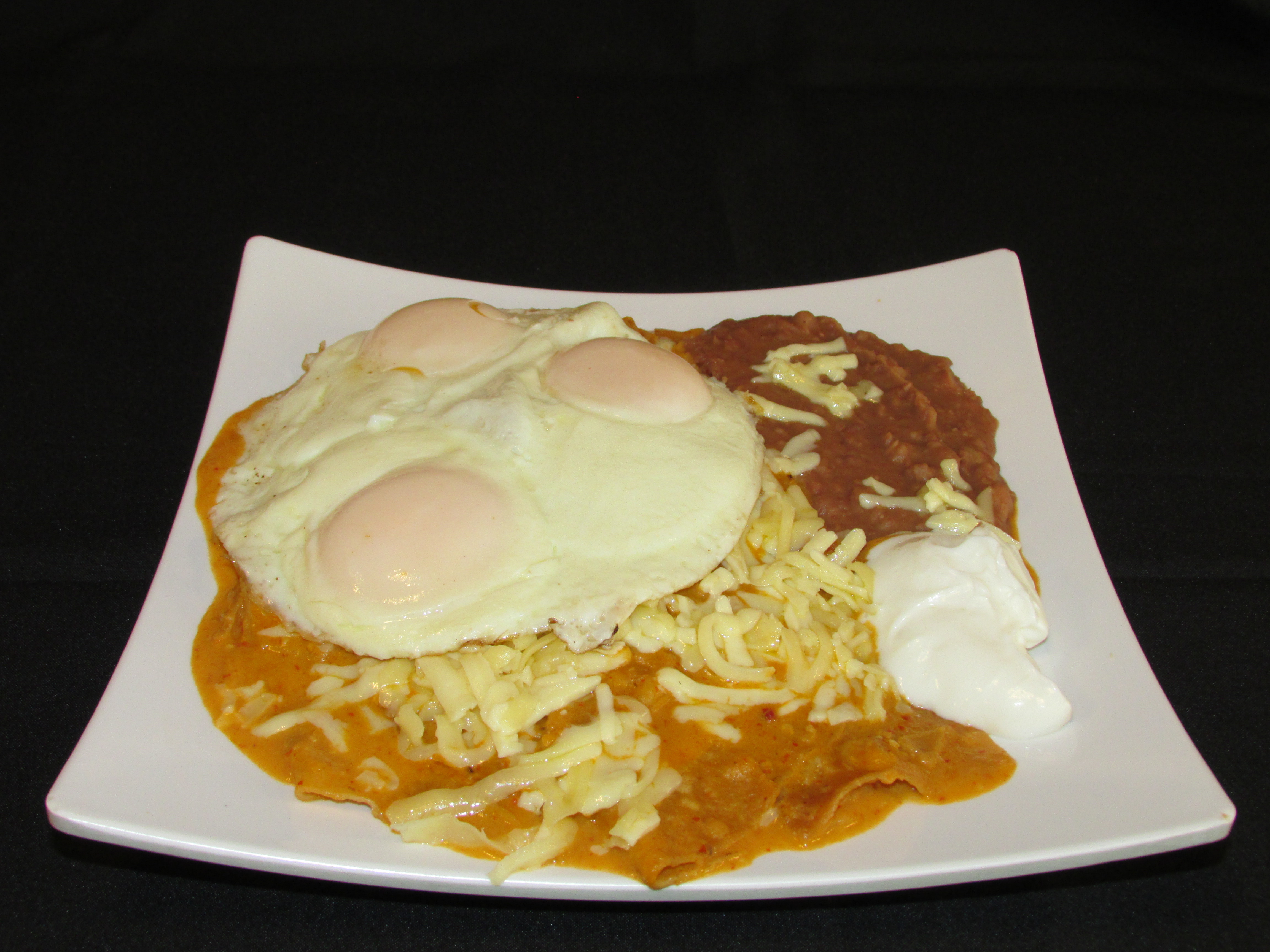 Order Chilaquiles food online from Taqueria Los Flacos store, Chicago on bringmethat.com
