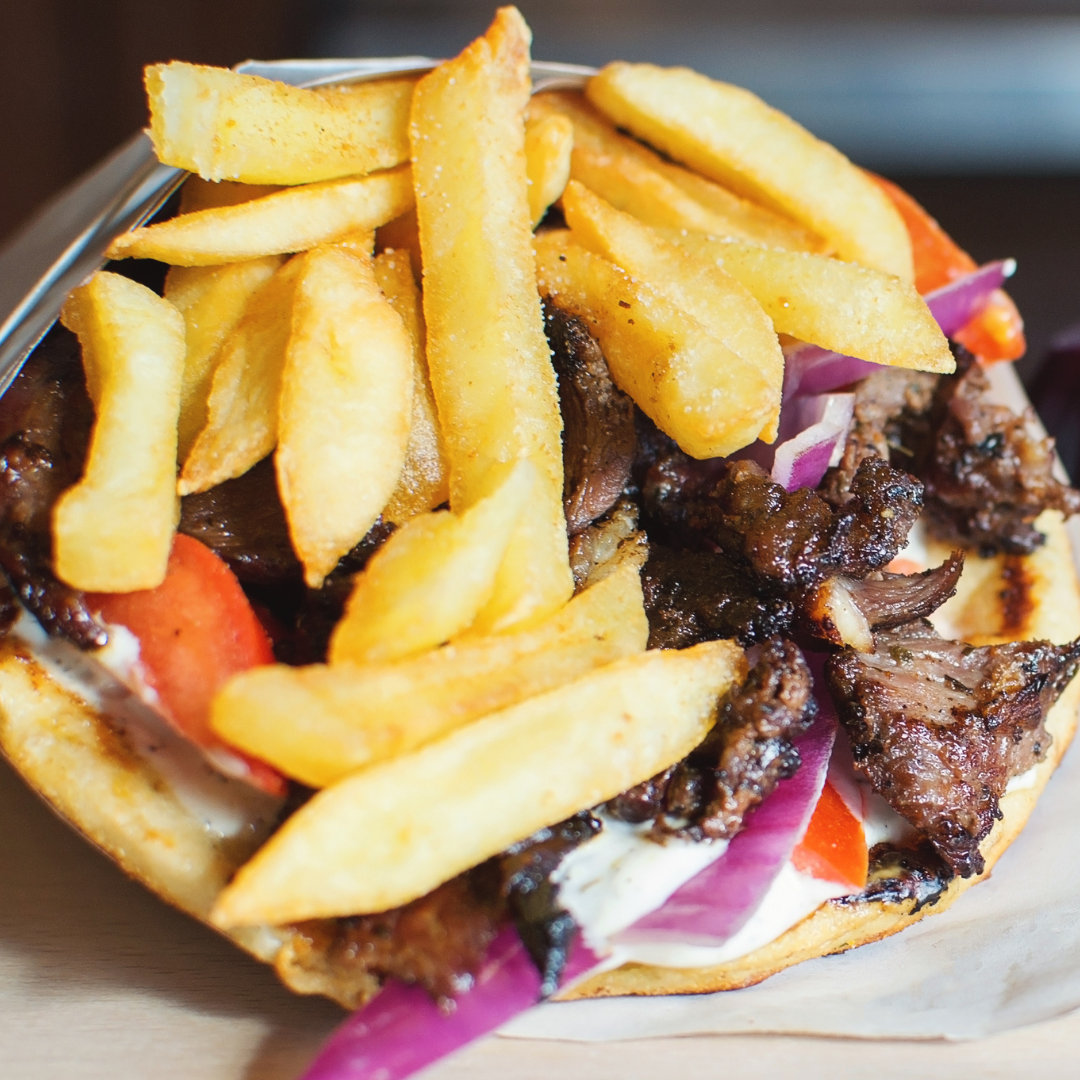 Order Traditional (Beef & Lamb) Gyro - Sandwich food online from Gyro Jimmys store, Carle Place on bringmethat.com