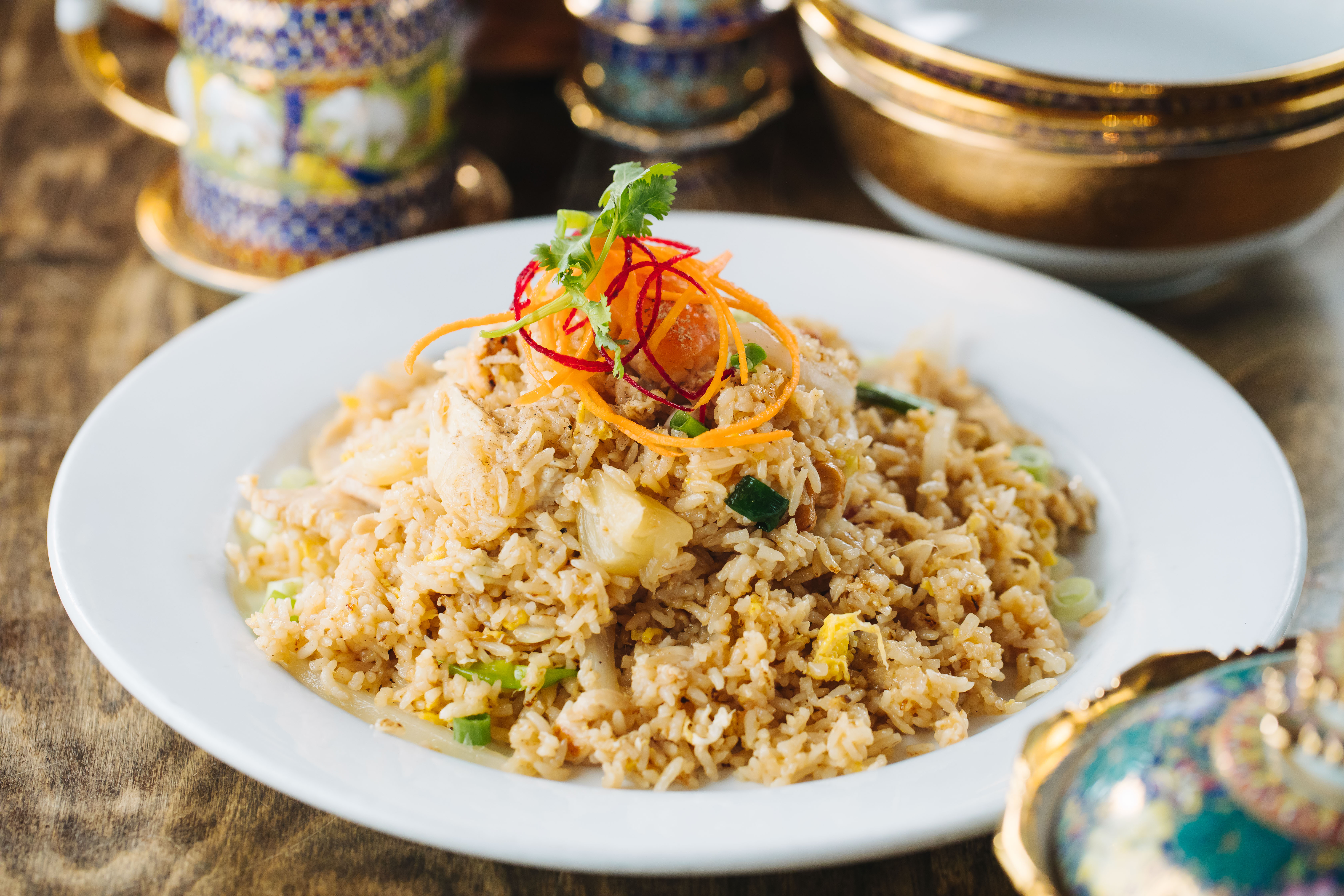 Order Pineapple Fried Rice food online from Si Lom Thai Asian store, Dallas on bringmethat.com