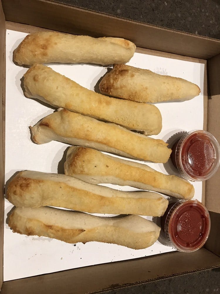 Order Bread Sticks - Appetizer food online from Val Pizza store, Owosso on bringmethat.com