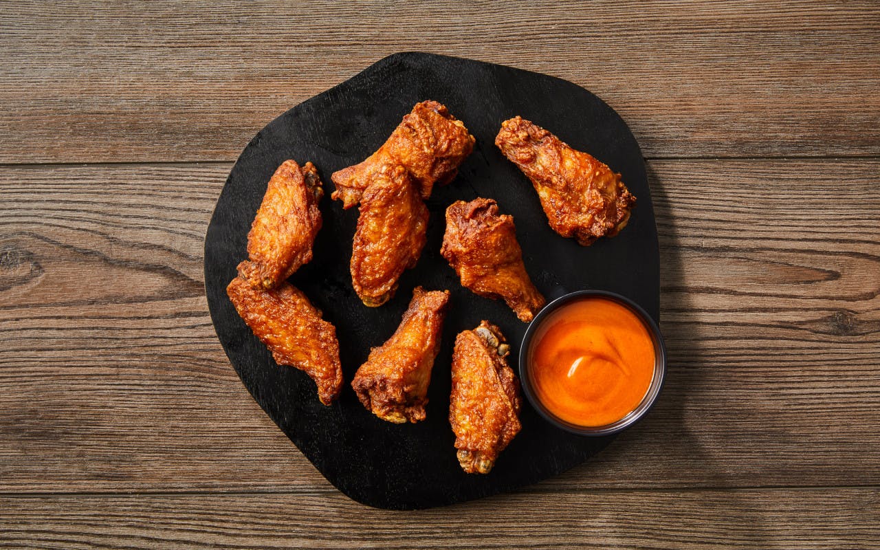 Order Traditional Wings - 8 Pieces food online from Fox Pizza Den store, Aliquippa on bringmethat.com