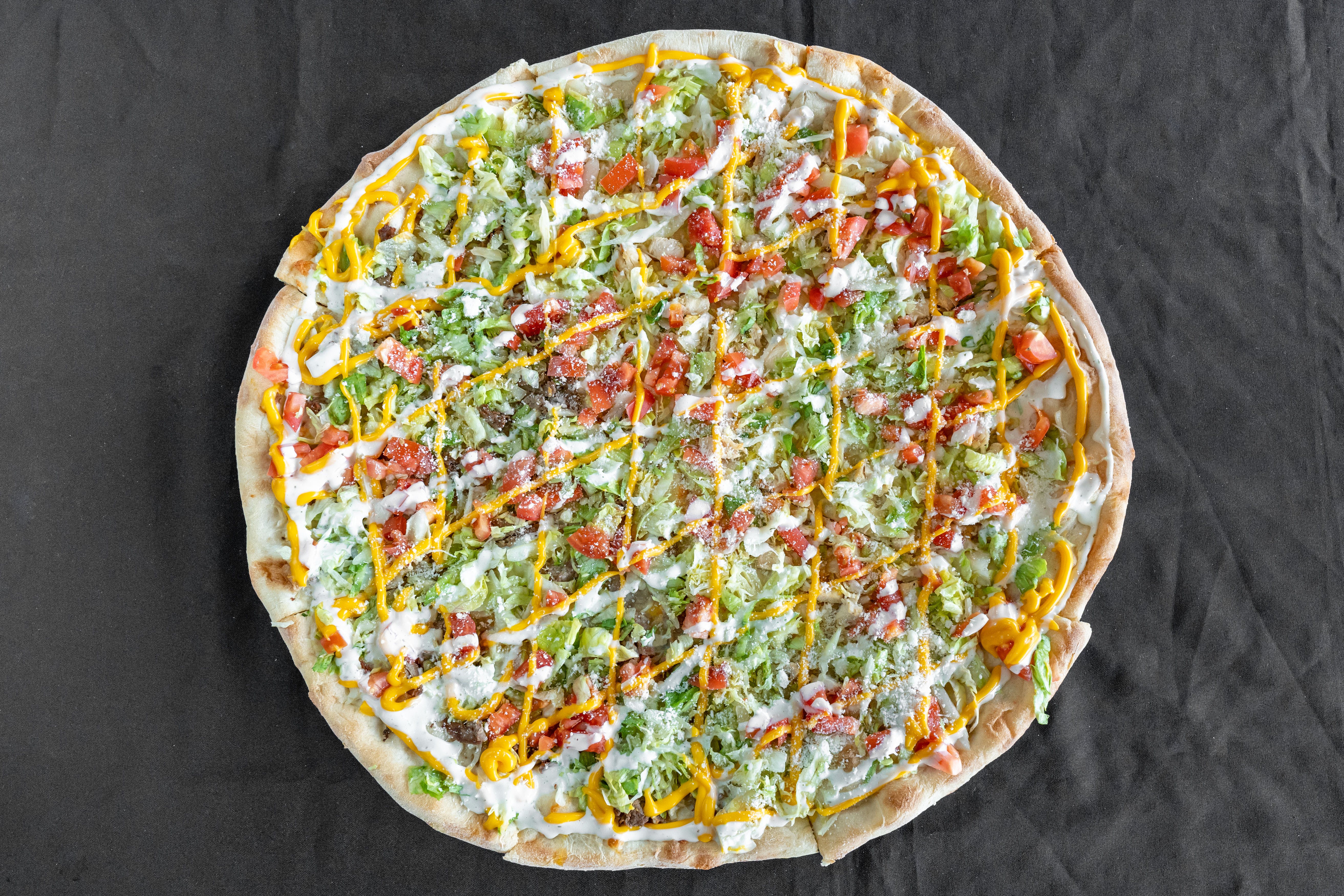 Order Chicken Taco Pizza - Medium 14" food online from Pizza Plaza Of Warminster store, Warminster on bringmethat.com