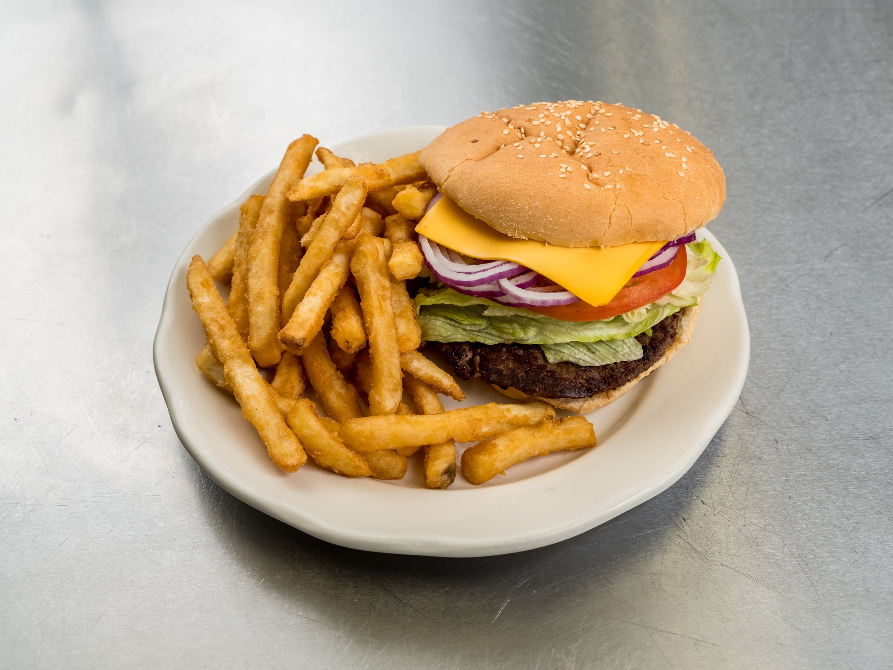 Order Cheeseburger Deluxe food online from D&B Deli store, Uniondale on bringmethat.com