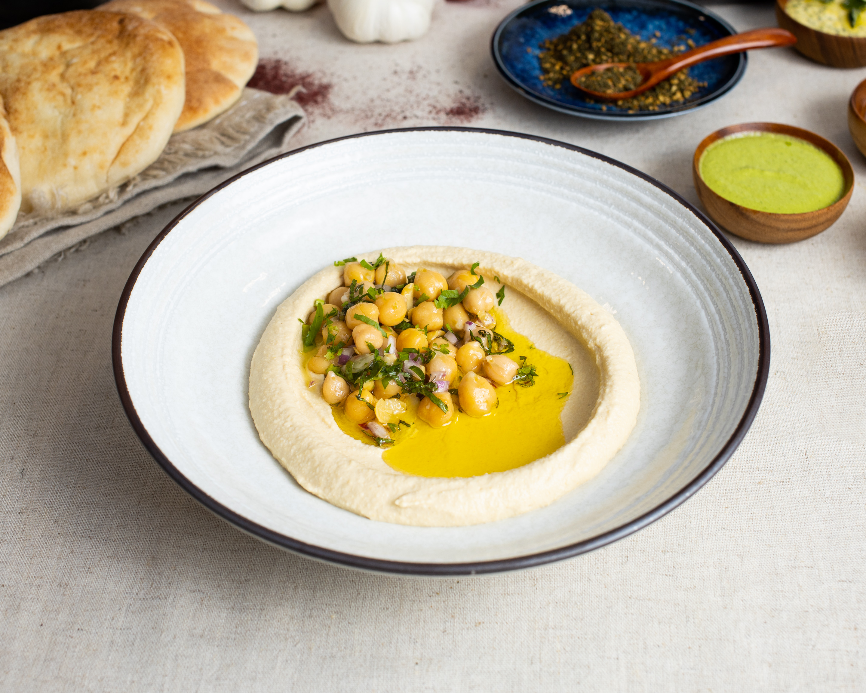 Order Hummus with Chickpea and Fresh Herbs Mix food online from Za'atar store, San Francisco on bringmethat.com