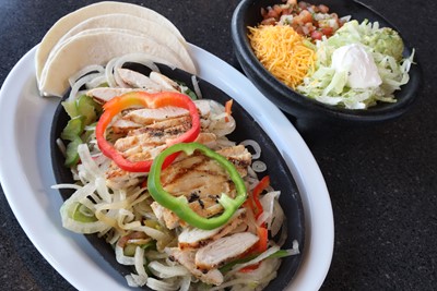 Order Mesquite-Grilled Chicken Fajitas food online from Tumbleweed Southwest Grill store, Wooster on bringmethat.com