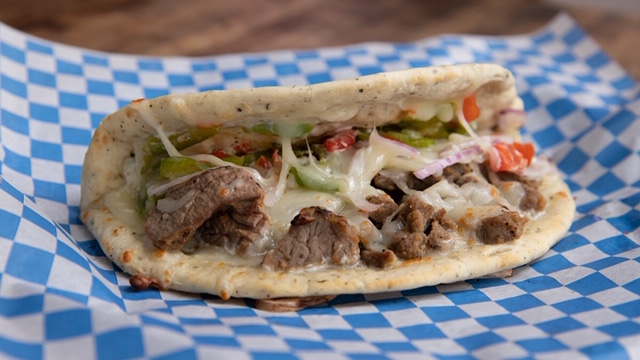 Order Hearty Steak and Cheese Pazini food online from Pizanos Pizza store, Reno on bringmethat.com