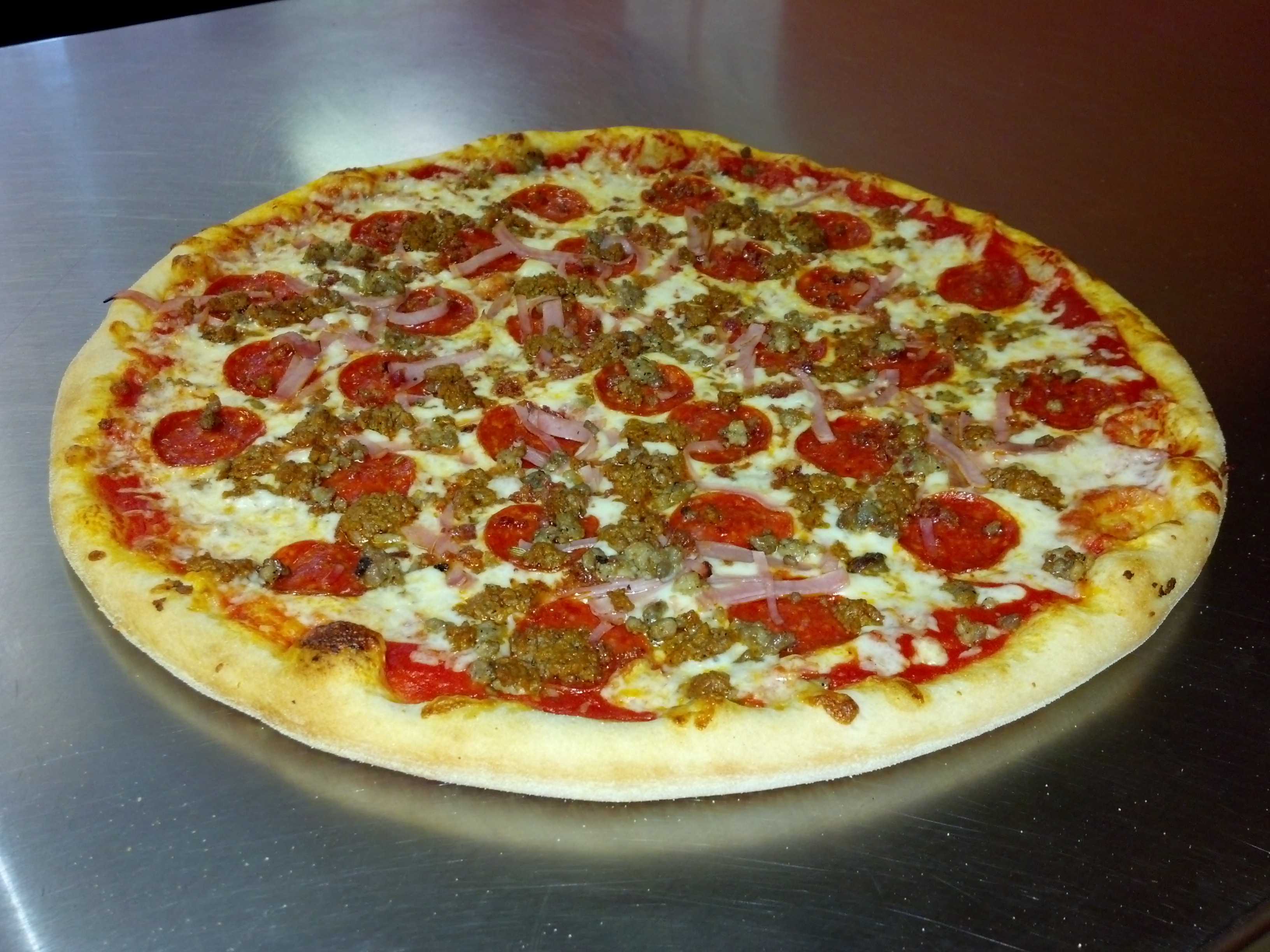 Order Meat Lovers Pizza food online from Mario's Original Pizza & Pasta store, Baltimore on bringmethat.com