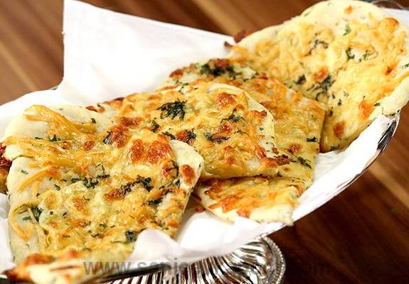 Order Cheesy Naan  food online from Desi Chops store, Louisville on bringmethat.com