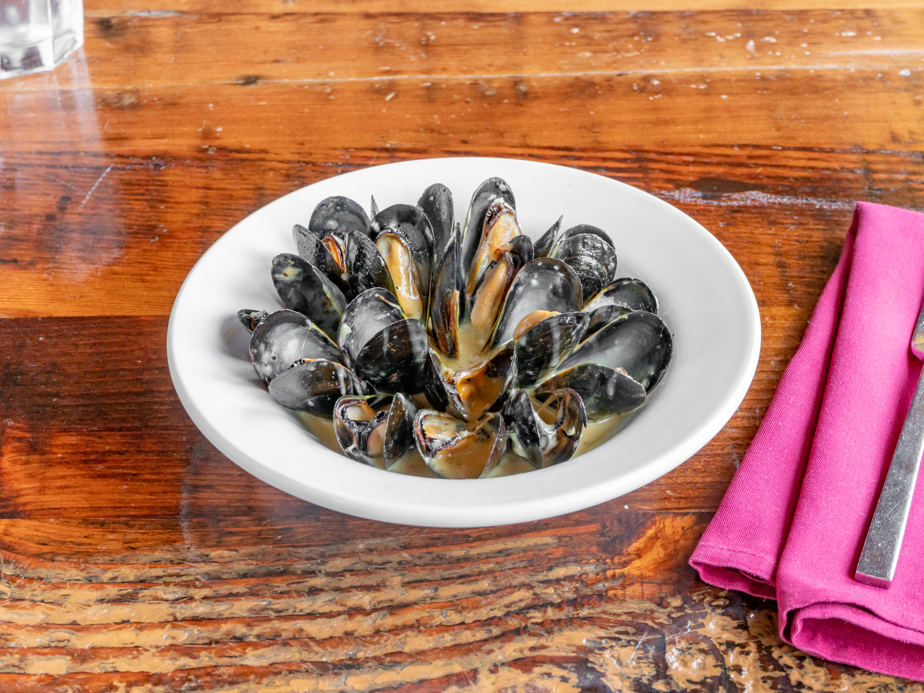 Order Garlic Cream Mussels food online from Cioppino's store, San Francisco on bringmethat.com