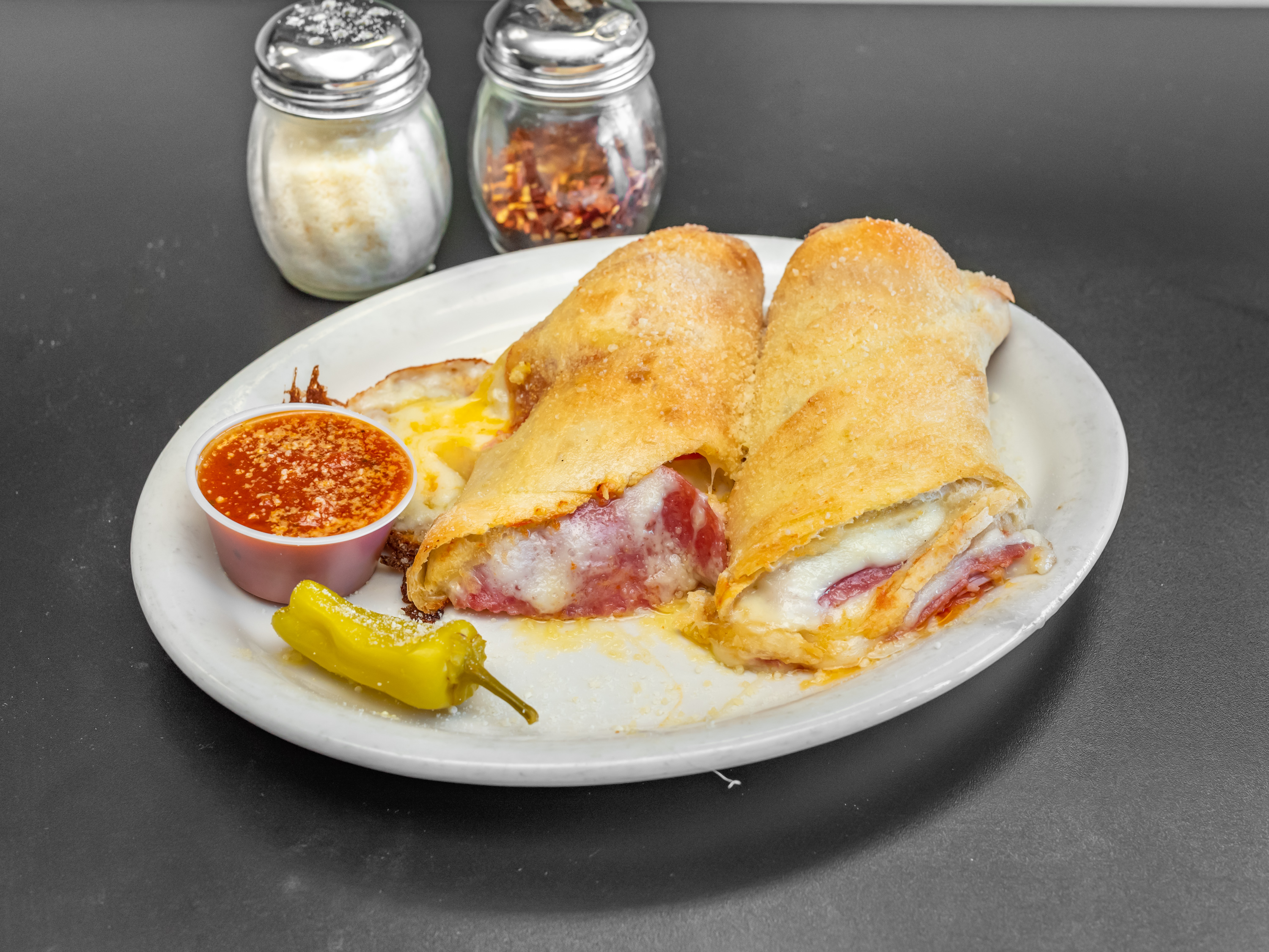 Order Stromboli food online from Tonti's Pizzeria store, Parker on bringmethat.com