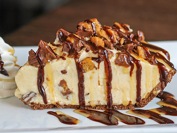 Order Peanut Butter Cup Pie food online from Reds At Thousand Oaks store, Grand Rapids on bringmethat.com