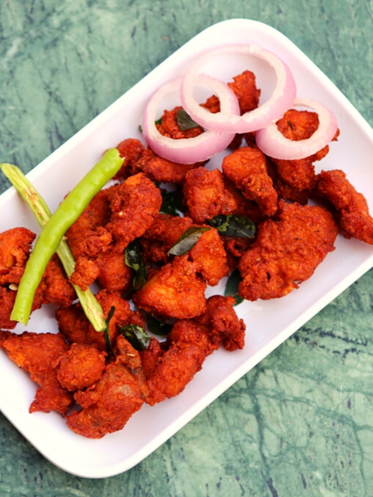 Order Chicken Pakoda food online from Cakes & Bakes store, Fremont on bringmethat.com