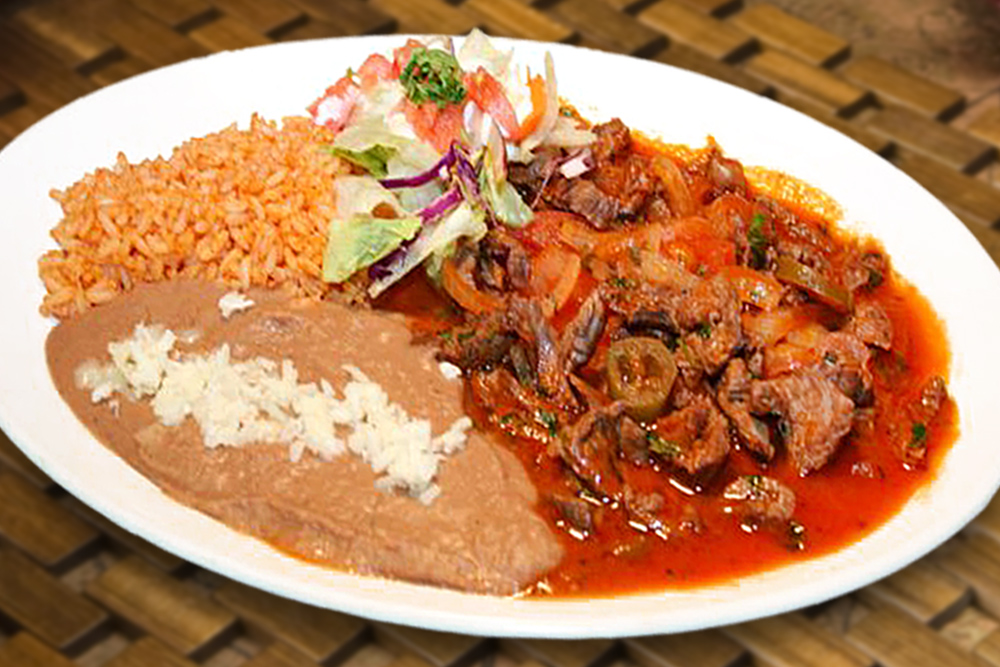 Order Bistec Ranchero food online from Taqueria San Miguel store, Cathedral City on bringmethat.com