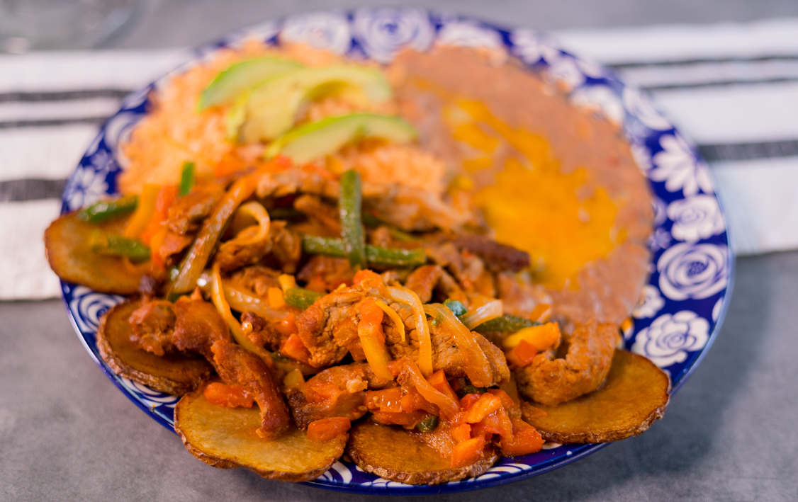 Order Puerco Lindo food online from Chelinos Mexican Restaurant store, Oklahoma City on bringmethat.com