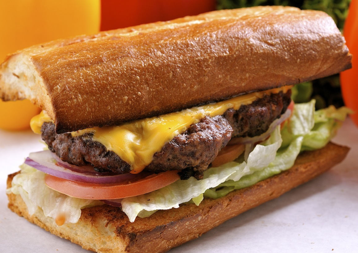 Order Deluxe Cheeseburger and Chips food online from Village Host Pizza store, San Luis Obispo on bringmethat.com