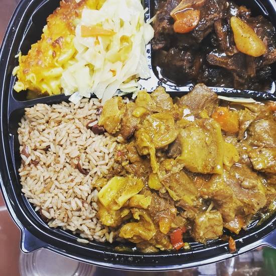 Order Curry Goat Platter food online from Jamaican Cafe Cuisine store, Newark on bringmethat.com
