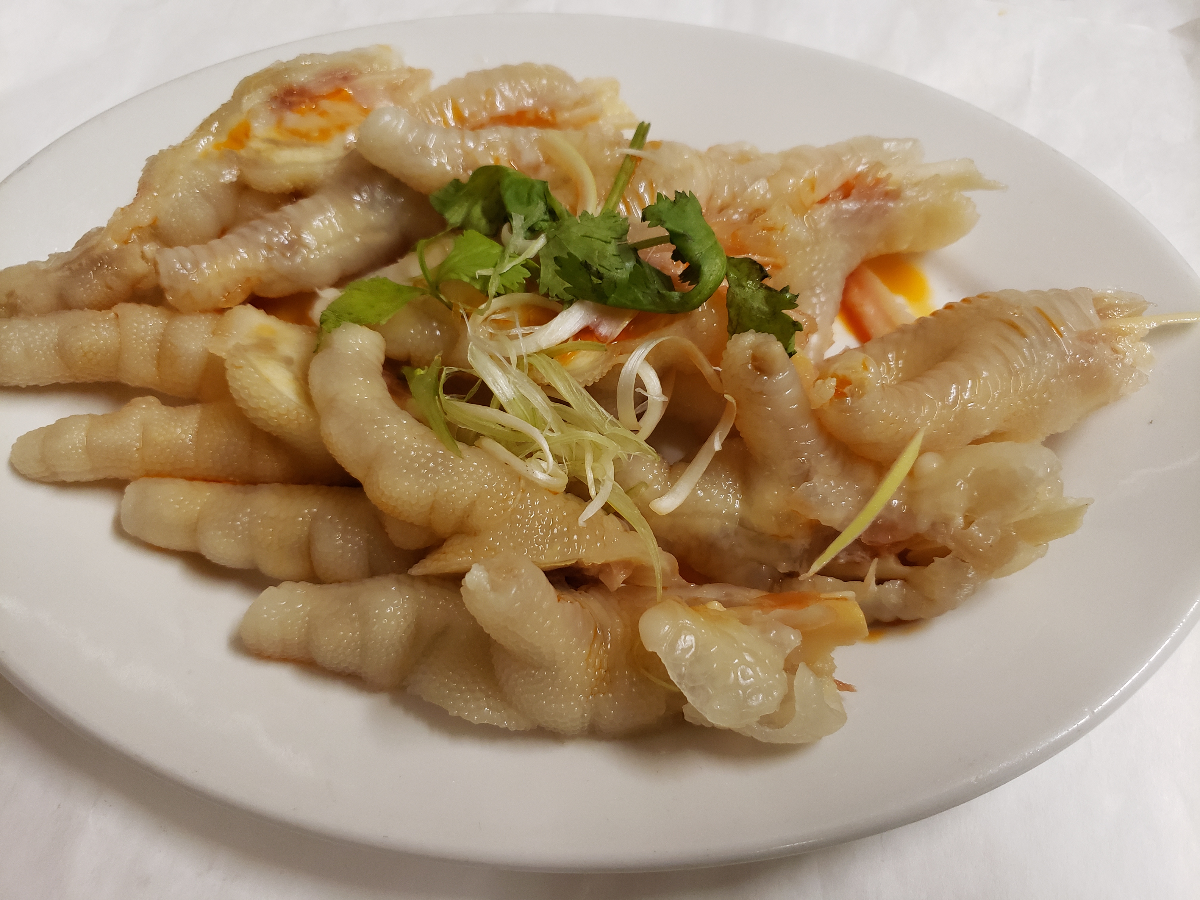 Order 100. Spicy White Chicken Feet 泡椒凤爪 food online from Jade Palace store, Louisville on bringmethat.com